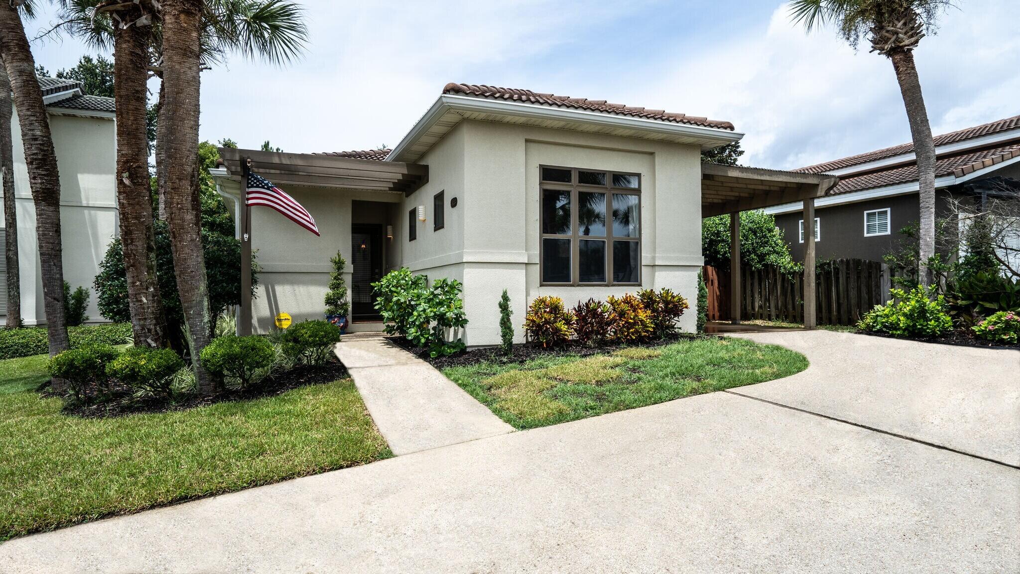 It's a Knockout with its contemporary and cozy feel, awesome finishes/special touches, and a great location in the beautiful Italian themed neighborhood of Tuscany! Click on the photos to discover the cozy/comfortable feel this home has to offer with Luxury Vinyl Tile throughout the living space and dark hardwood in the bedrooms. Custom closets appear in both bedrooms, add to that modern ceiling fans, craftsman style window & door casements, a shiplap element wall, separate shoe closet, pass through kitchen counter and so much more!  Smart touch technology for the HVAC system controls costs while having maximum comfort. Outside the home gorgeous landscaping creates great curb appeal, you have a fenced backyard with covered patio, and an outdoor shower. Don't delay...see it today!