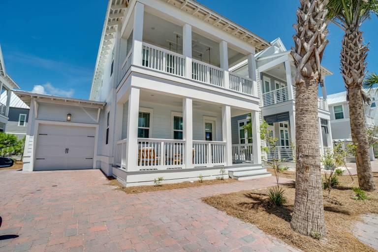 Desirable Panama floor plan in one of the only homes in the community that enjoys both views of the Gulf, and of the neighborhood resort-style pool. Located on the southernmost street in Prominence South, and just a short stroll to the Beach Club, this home will generate over $130K in 2022 making it a perfect second-home or investment property! Interior features include hardwood flooring, 10-foot smooth-finish ceilings, 2 Master Suites, 8 foot interior doors, upgraded shiplap details, custom built-in bunks, and a cool coastal color palette throughout. The open floor plan on the first level allows guests to seamlessly interact whether they are enjoying al fresco dining on the expanded paver patio, preparing a meal in the kitchen, or socializing in the living area. Located off the kitchen you find a powder bath for guests, and the spacious 1st floor Master Suite tucked behind for ample privacy. In addition to the covered front porch, this home offers secondary lounging space on the covered rear deck off the Master Suite with a patio that opens to the shared green space behind the property. The second level of the home boasts a secondary Master Suite, two additional Guest Bedrooms - one a King bedroom and the other with custom built in bunks-, plus a private office with a Daybed for extra guests. The covered balcony that runs the length of the front of the home has a cozy swing bed, perfect for enjoying coffee, or cocktails, with a Gulf view! Finishing out the property is a 1-car garage, with expanded paver driveway, allowing parking for 4 vehicles plus a golf cart. If you are looking for a move-in ready home, just steps from all the action, with a designer feel and room for all your guests, then this is a must-see!
Join the optional WaterSound/St Joe Beach Club with private beach access, full beach services, 2 pools, 2 restaurants and tennis courts - All just short stroll 3 homes down the road! Prominence Features Amazing Community Amenities to include Resort Style Pools, Fitness Center, Private Beach Shuttle Service, and ''The Hub,'' Town Center, fully complemented with Restaurants, Shops, and an Amphitheater for Concerts, Events, and a Cinema Screen for Movies.
Information contained within this listing is deemed to be correct but should be verified by Buyer.