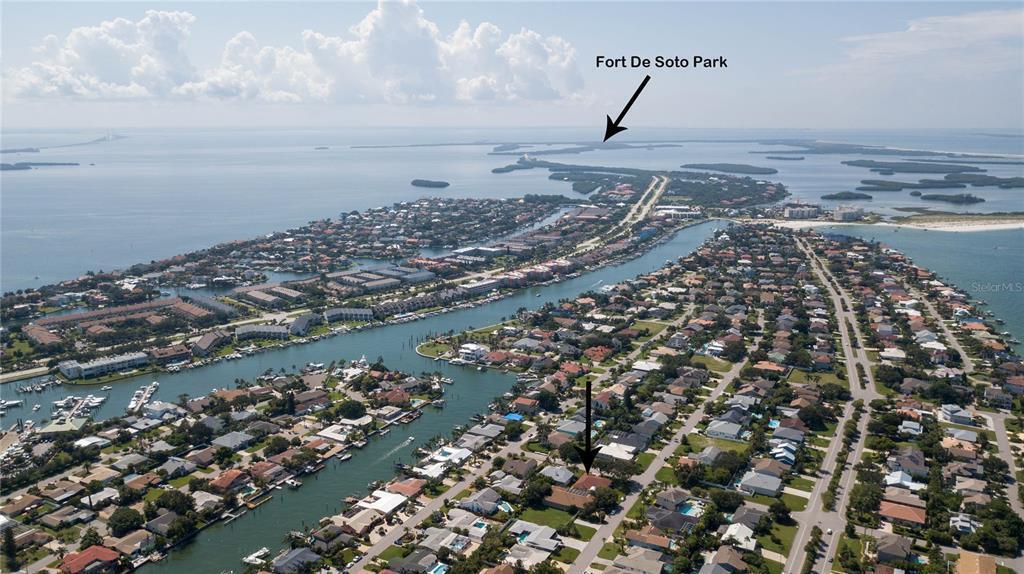 Tierra Verde FL. Island Community, Gulf & Intracoastal
Seller is in the process of separating the lots, so the lots can be sold separately if buyer prefers.*** Come live in paradise where others vacation and move into this rare DOUBLE LOT 3 bedroom, 3 bath, 2 car garage pool home on the island of Tierra Verde. The home recently underwent many upgrades totaling over $210,000. The extra full lot can be converted back as a separate lot to build another home on. Or just keep it for all your large toys and extra entertainment space. The major upgrades/updates included a birdcage to enclose the private walled in pool area and outdoor kitchen, the master bathroom, the guest bathroom, and the kitchen upgraded to a Chef's preferred gas range. The homeowner also purchased the empty lot next door The exterior of the home conveniently has a full RV HOOK UP with a 50 amp outlet, water, and a clean out to empty your RV tanks in. Come in through the grand entrance and the private modern Mediterranean style courtyard with a pool and outdoor kitchen awaits. The area is walled in and bird caged to keep the bugs out. There is a separate private 1 bedroom, 1 bath mother in law/guest house to the right of the front entrance as you come in. The main house is open and inviting and accentuated with an abundant of natural lighting and has tile floors throughout for your peace of mind. The kitchen is well appointed with stainless steel appliances and solid surface counters and solid wood cabinets. The living room, formal dining room and another seating area are open and designed to entertain your family and friends with ease. The second room will include a murphy's bed and connects to the quest bathroom. The master suite is spacious with 2 walk-in closets and a brand new fully renovated master bathroom. You will truly live in paradise in this home. Then you also have award winning beaches such as Fort De Soto and St Pete Beach just minutes away. Other entertainments and restaurants are on Tierra Verde itself and travel on the water and road has been made more convenient with the addition of a brand new taller bridge to eliminate the need of a drawbridge. If you want to enjoy other amenities that Champa Bay has to offer, I275 is minutes away and can take you where you want to go. Schedule your showing today and make this rare 2 lot home yours and live where others vacation! REALTORS, Check out the Realtor Remarks.
