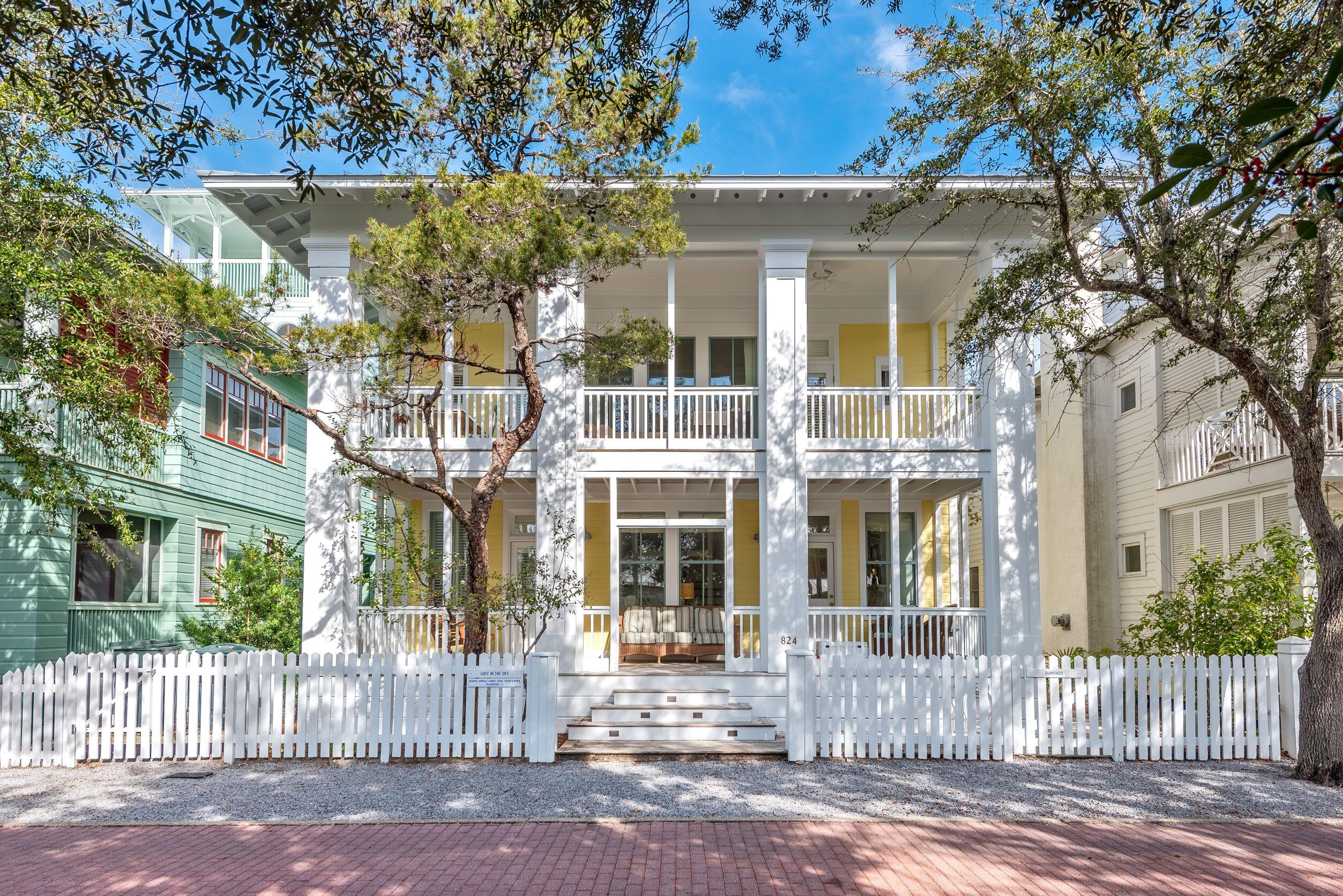 This fabulous beach home is exceptionally functional for a large or extended family and enjoys a prime location!  Overlooking the west-end family pool complex, you could almost relax on your front porch while watching the kiddos splash around.  And being just a stone's throw from the beach, your family can enjoy the best of what Seaside offers!

With a creative design, ''Lucy in the Sky'' and ''Diamonds'' offers a very flexible floor plan depending on your needs.  Because the main and guest houses blend so seamlessly, you can create a variety of options - the guest house could have one bedroom while the main house has four; or the guest house could have two bedrooms while the main house has three; or any combination that works best for your family.  Access to the guest house can be from within the main house or its own exterior entrance, allowing for privacy or use as a separate rental cottage.

The main house offers ample space for everyone.  Conveniently located off the dining room is a large family room accented by a fireplace.  There's a full bath down for convenience, and three bedrooms and two baths are up.  From the second floor you can access the tower for awesome views and sunset watching.  Generous two-story porches anchor the front of the home and allow for plenty of outdoor living.

Recent maintenance items include the exterior having just been repainted, a brand-new roof installed, eight new windows, and a new water heater in the guest house.