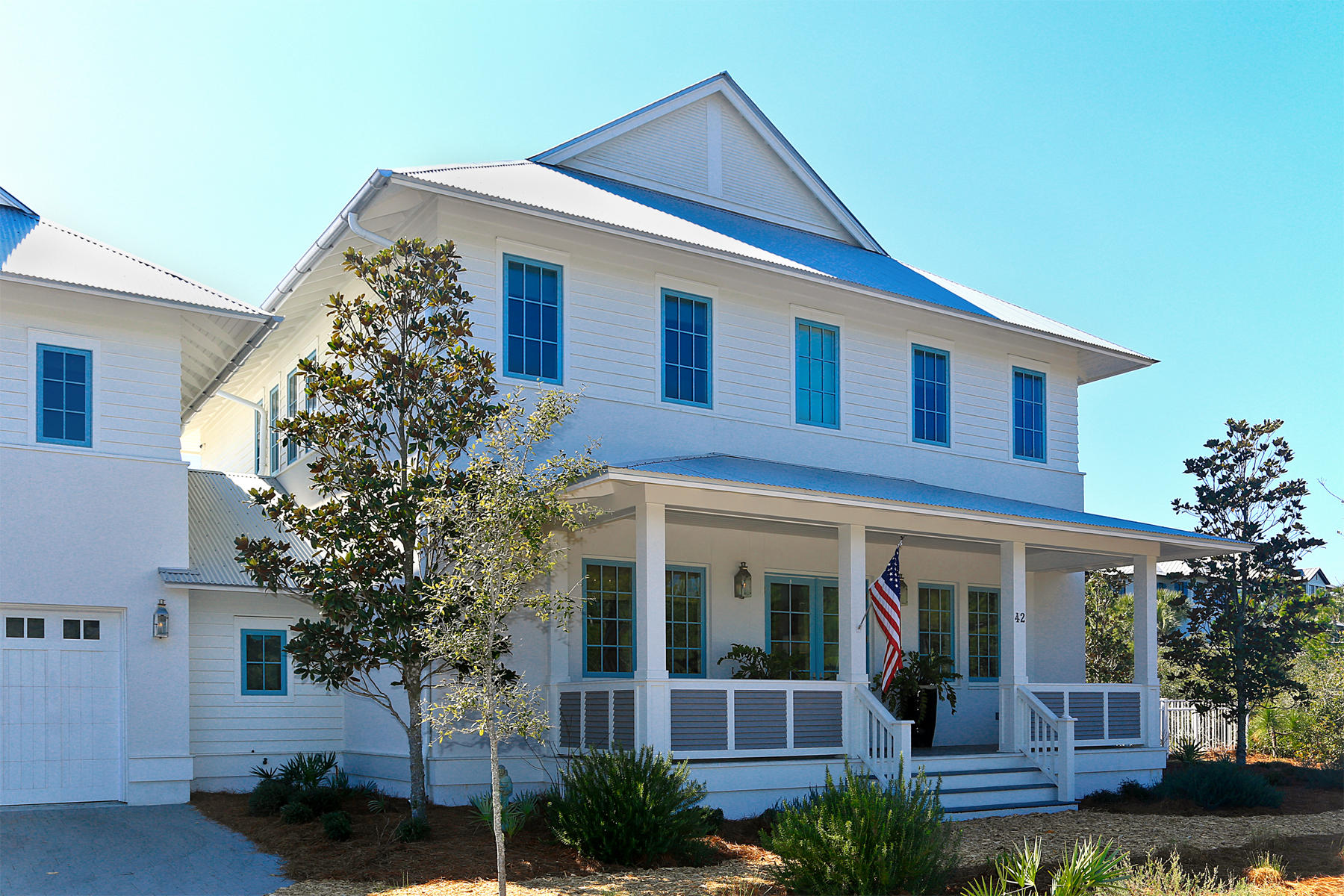 Luxury abounds in this Santa Rosa Beach home in the exclusive, gated community of The Retreat. Completed in 2014 to the highest specifications, this lavish residence creates a wonderful first impression with full width porch across the front of the house. The two story carriage house has its own self contained suite including a dining, kitchen, living room, king-size master and bunk room. In the main residence, polished wood flooring graces the formal dining area beneath the central staircase. No less impressive is the family sized kitchen showcasing pristine white cabinetry with panel doors, stainless steel appliances and island dining. Muted grey and white dcor throughout creates a calm ambiance, not least in the convenient first floor master bedroom. Its stylish bath includes a double tub and separate shower. Throughout the home, ample nooks and sitting areas provide the opportunity for families to spread out and relax. The extensive second floor game room will be a source of pleasure for kids of all ages, while the large screened porch with oyster shell fireplace is a snug place for cooler evenings. Private outdoor living can be enjoyed from a choice of balconies, including one overlooking the sundeck and swimming pool. Close to the beach, with a secure fenced yard for family pets, this grand family home is the ultimate place to live, dine and play.