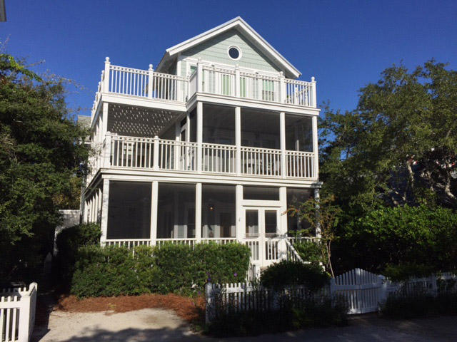 Main Cottage- 1742 sq.ft. heated/cooled, 1852 sq.ft. porch/deck
2 bedrooms, tower bunk room for 6, 2-1/2 baths. Guest Cottage  523 sq.ft. heated/cooled, 105 porch /balcony, 1 bedroom, 1 bath. Perfectly located three lots in from 30A and just a few steps to the beach or downtown Seaside. This beach retreat begins with three wraparound porches - savoring Gulf views, a cool ocean breeze and the melodic rhythm of the surf. Step through the double screen doors on to the front porch furnished with comfortable wicker pieces creating a welcoming conversation area. The soft subtle interior palette along with a unique blending of antiques and new pieces used throughout the cottage evokes comfort and sophistication. The open floor plan keeps the conversation flowing between the kitchen and dining area while relaxing in the living area. The hearth is finish with Cambria natural quartz and is the focal point of the living area. The family chef will enjoy preparing family meals in the kitchen filled with natural light from the bank of windows. Display your favorite dishes and glassware in the floor to ceiling antique side board. Surrounding the vintage prep table is a six burner Wolf gas stove with hood, Sub-Zero Refrigerator and KitchenAide dishwasher. Microwave and auxiliary oven are neatly stacked nearby. Cambria quartz was also selected for the countertops due to its durable nonporous surface. Outdoor dining area with gas grill is just off the kitchen. Wooden shutters were salvaged and repurposed as entry doors to pantry, laundry and half bath. On the second floor are two bedrooms, each has its own personality and presence. The master suite with upholstered and wrought iron bed along with natural bed linens creates a restful sleeping space. The guest bedroom and bath continue the peaceful tranquility of the cottage. Both bedrooms have private porches perfect for sunbathing or curl up with a good book on the outdoor swing bed. The entire 3rd floor is the tower bunk room with six sleeping accommodations for children to bring their best friends. At this level is a wrap around deck to enjoy gulf views as the sun rises or view amazing sunsets or star gazing. The interiors of the guest cottage are as warm and inviting as the main cottage. Sunlight cascades in from 4 full view glass doors. A fireplace creates ambiance in the living area. The kitchen is set into a spacious bay off the living area.  The bedroom suite above features vaulted ceiling, soaking tub and private wrap around balcony.