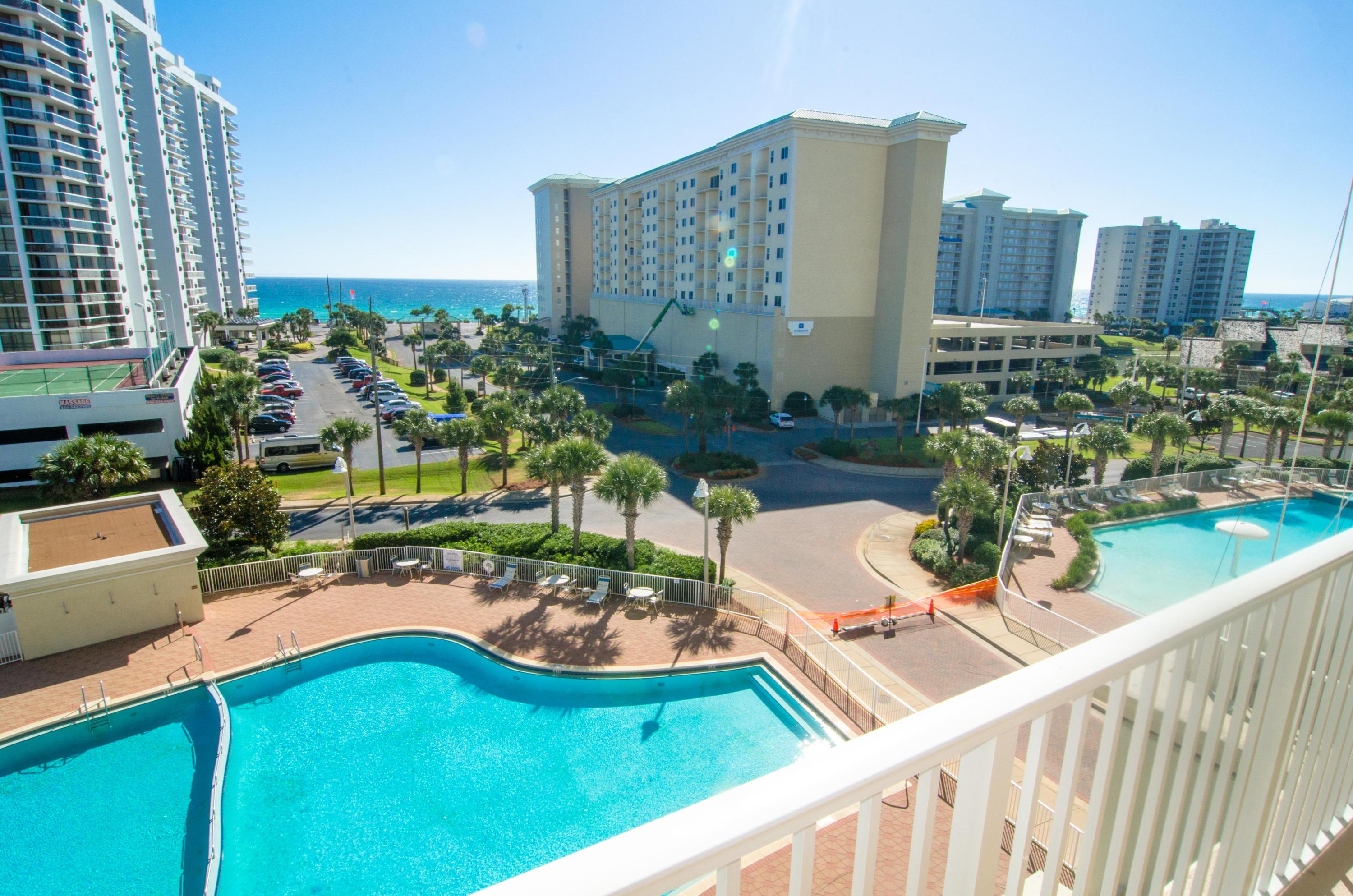 A true resort condo located in highly desired Ariel Dunes, you'll fall in love with this beachy chic 2 bedroom, 2 bath condo. This is the deal you have been waiting for...situated near the best stretch of Destin's white sand beach, this condo showcases incredible views of the beautiful Gulf of Mexico and is offered fully/beautifully furnished with two spacious bedrooms including a GULF VIEW master suite with a spa-like master bath with gorgeous granite counters, a large living area with magnificent windows and a large balcony to take advantage of the unbelievable views, plus you'll love the stunning gourmet kitchen with slab granite counters and sleek stainless steel appliances. Enjoy the resort style amenities including: 24,000 sf of pools (4) with seasonally heated areas, tennis, on-site restaurant ''Cabana Cafe'', 18-hole on-site golf course and pro shop, 8 tennis courts and 2,000 feet of beautiful deeded beach.