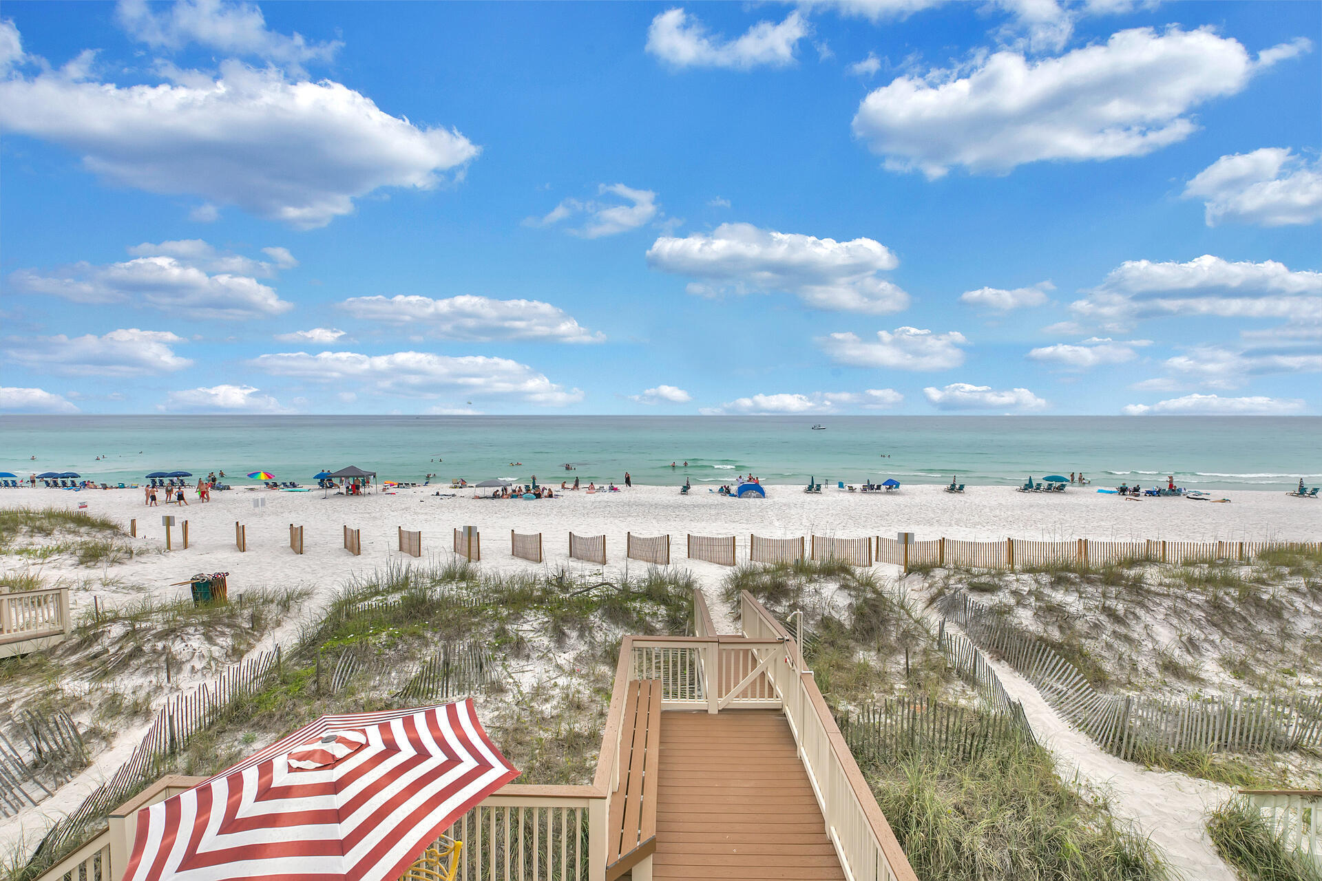 OWN YOUR PERSONAL PIECE OF PARADISE DIRECTLY ON THE SAND WITH PRIVATE BEACH & SECURITY GUARD. As opposed to private 'beach access', this large END unit townhome includes 30 ft of EXCLUSIVE, PRIVATE BEACH for ONLY owners & their guests. Offering TWO HOMES: a 3 BR/2.5 BA main home PLUS a 1 BR/1BA apartment w/living, dining areas, full kitchen & separate entrance, use 1 home for yourself & rent the other, or rent both!  1700 SF of newer Trex decking which provides stunning views & ocean breezes from all 3 levels, includes a GIANT 1008 SF ocean front deck adjoining your private beach. REAL performance & REAL numbers, w/>152K already in the bank,(even w/covid) over last 12 months, now's the time to secure this Gulf front powerhouse. Offering stunning Gulf views from almost every room, live the Gulf front lifestyle you've always dreamed of while generating income when you're not there. Offering 4 BRs, 2 liv areas, 2 kitchens & parking for 4 cars, there's room for everyone. An add'l 200 SF heated/cooled unfinished space above master bedroom could be easily converted to a large 5th BR. Wake up to crashing waves & enjoy your morning coffee from one of the 3 amazing Gulf front decks. Designed to accommodate large groups & maximize rental income, this powerhouse beach rental w/low $3124/year HOA fees, is being sold fully furnished and turn-key ready. HOA employs a security guard during high season on both sides of the beach to assure your private beach is only used by you & your guests! Located in the heart of Destin, this Gulf front Home is close to fantastic restaurants, shopping, tennis & golf.