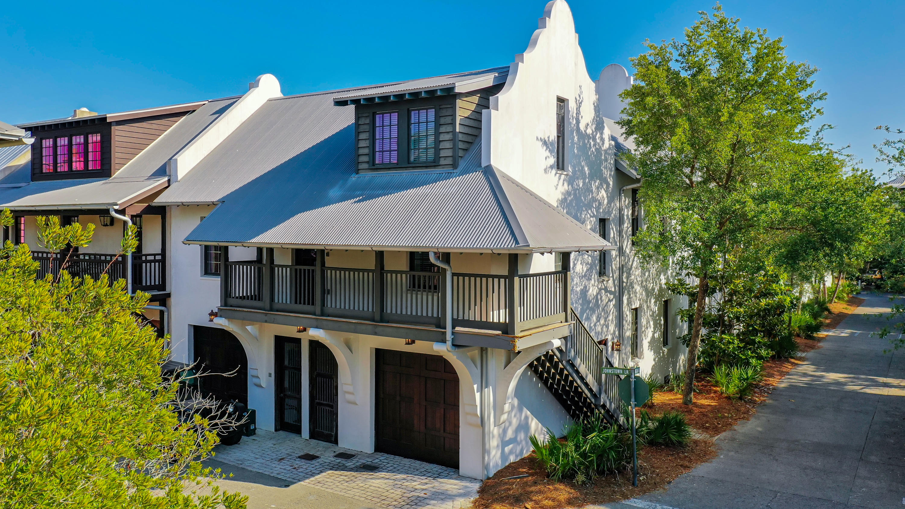 This beautiful courtyard style three-story home with detached carriage house is located on a desirable corner lot overlooking the neighborhood Cabana Pool. Freshly painted and professionally decorated, this inviting residence includes 5 bedrooms and 5.5 baths and totals 4,078 square feet. Enter the home on the first floor and you find a master bedroom suite with a full 2-vanity bathroom, a large laundry/mud room with access to the courtyard, a bunk room that sleeps four, an additional full bathroom, and a second bedroom. The delightful courtyard with private spa has plenty of room for relaxing and entertaining. The second level includes the main living area, with ample dining area and a half bath. The open kitchen with eat in bar has stylish stone counter tops and stainless steel appliances. Also on this level, the spacious vaulted master suite with a gorgeous spa-like bathroom. From the living area a spiral staircase leads to the third floor area which is perfect for the kids with two trundle beds, pool table and a full bathroom. The third level could easily serve as an additional bedroom. The large carriage home includes an open vaulted living area and full kitchen with breakfast bar, master bedroom with ensuite bathroom, convenient washer and dryer, plus a loft area for additional sleeping. The carriage home has both a private entrance or access from the second floor balcony breezeway. There's a garage under the carriage house. The home is offered furnished. Incredible Rental Projections of $177,000!
