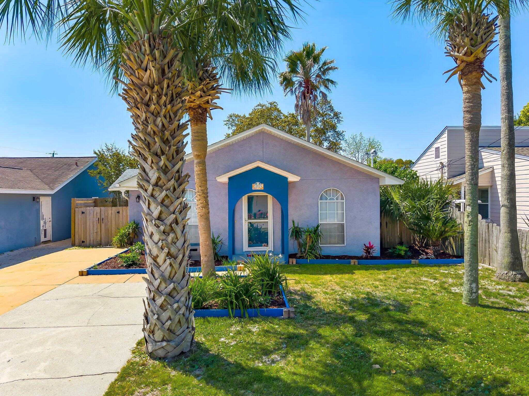 This isn't your average beach house—it's upgraded, move-in ready, and the location everyone's after. Located on the west end of Panama City Beach with NO HOA, this 2 bed, 2 bath home features freshly painted cabinets, new hardware, quartz countertops, and upgraded bathrooms, including a marble walk-in shower with a frameless glass door. Additionally- a NEW HVAC system adds comfort and peace of mind.

Step outside to a fully fenced backyard—private with plenty of space for a splash pool or outdoor living area. Grab your towels and walk to the beach—whether you're looking for a primary home, second home, or short-term rental, this one fits the lifestyle! Schedule a showing today!