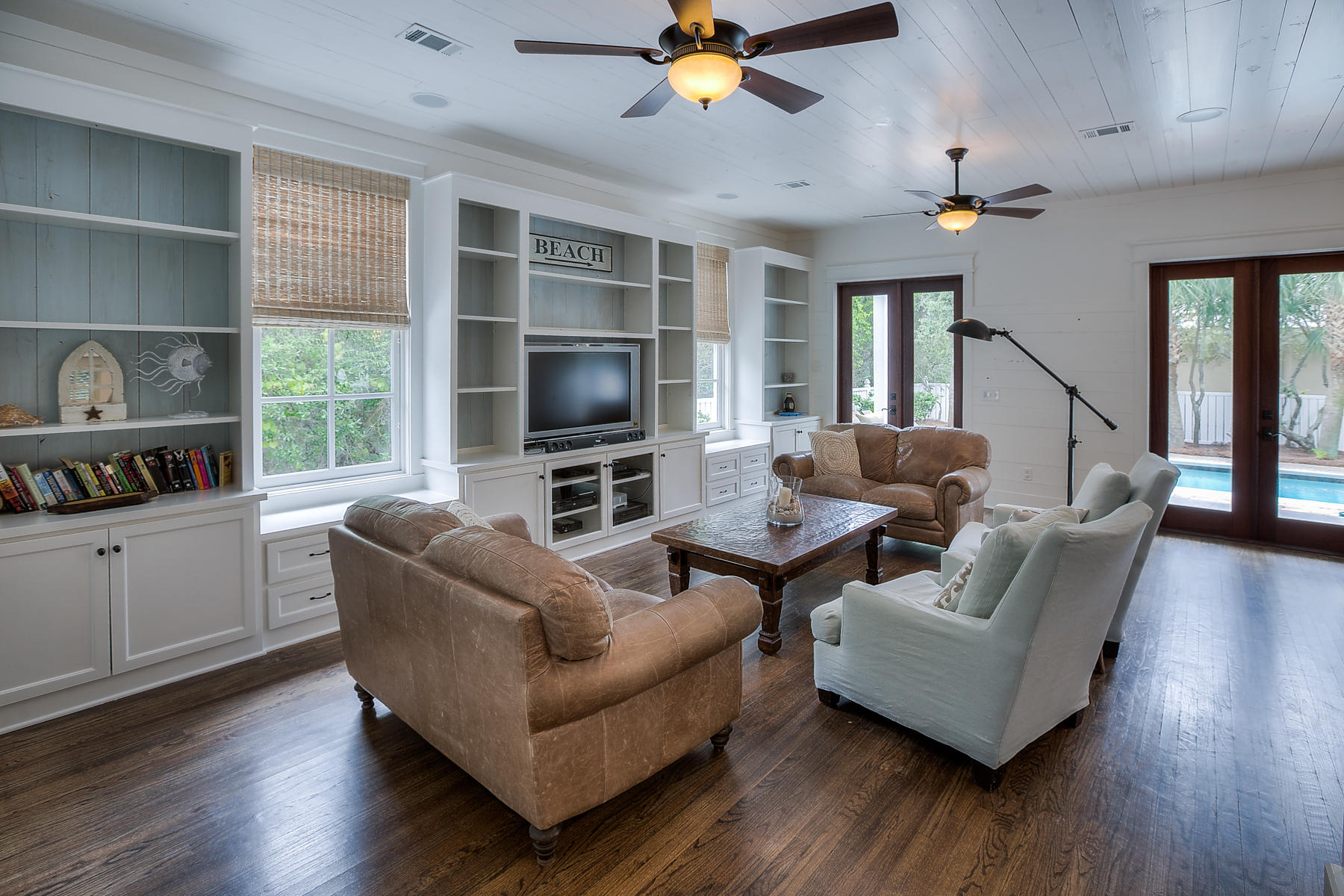 Charming beach house, located in a quaint 7 lot subdivision! This home offers parking for approximately 6 cars,a private neighborhood path to beach access, landscape lighting, a private heated pool with a large pool deck, 2 large porches and a 3rd level balcony that overlooks the Gulf of Mexico. The home has a master bedroom on both the first and second level and two queen size bunk rooms. Each bunk room has its own private bath, each with a double vanity. There are 3 living areas, one on each floor! The living area on the 3rd level is complete with a queen futon and a wet bar! This home was recently renovated. These renovations include wood planking on some walls and ceilings, new window treatments, hardwood floors throughout, new 16 SEER HVAC systems, foam insulation added to the tower roof, new mahogany rear doors and the exterior was painted with SW Duration paint.  The pool was finished with new plaster, tile and equipment also!  This is a great home for vacations and entertaining!  The home is centrally located on 30A and is close to shopping and restaurant and most importantly the beach!  You will enjoy the charm and privacy this quaint little neighborhood has to offer and the short walk to the beach and views from the porch are not too bad either!!  Paradise awaits for you at this beautiful beach home!!