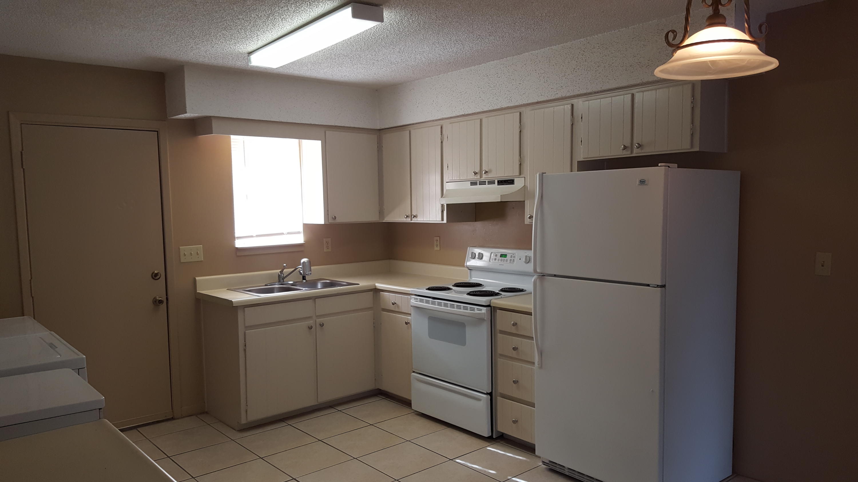 Available May 1st! Very clean and updated 2 bedroom, 1 bath duplex. Newer paint, neutral carpet, and tile floors. Open kitchen with painted cabinets includes refrigerator, washer and dryer. No inside smoking allowed. No pets. Across the street is a playground and basketball court. Tenants are responsible for all utilities.