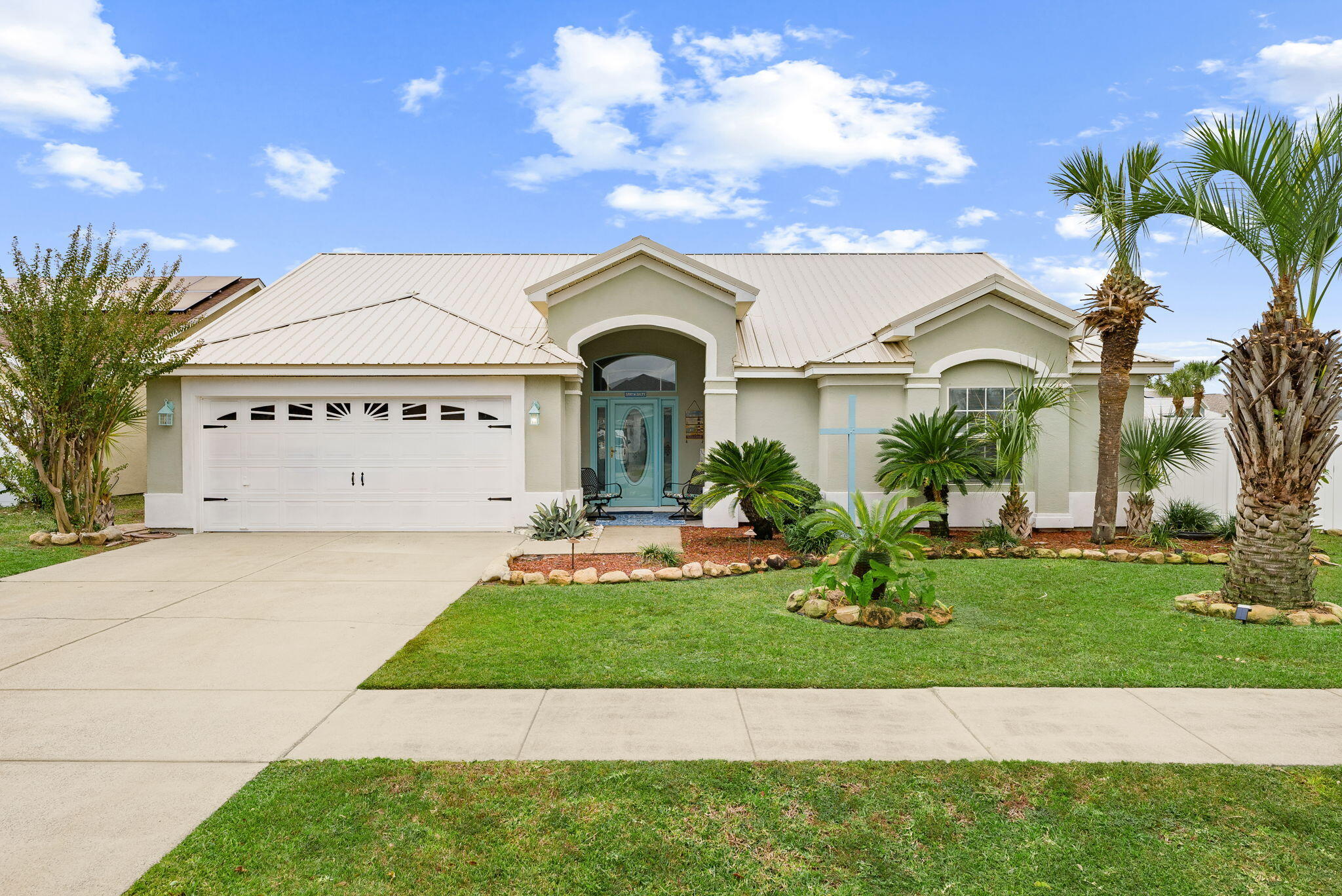 Welcome to Summerwood! This exceptional home features three bedrooms, two full bathrooms, large BONUS ROOM and a private Saltwater Pool! Situated on an oversized 70x121 corner lot on the south side of Highway 98, this meticulously remodeled home offers the perfect blend of luxury, comfort, and space. Step inside to discover a large, open floor plan featuring numerous new updates. The owner has truly thought of everything in this renovation, including new paint on ceilings, walls, doors, door frames, and all trim throughout the house. Refinished kitchen cabinets, new appliances including stove, refrigerator, dishwasher, undermount sink, faucet, garbage disposal with an on/off counter mount button and a beautiful island with quartz countertops. LVP flooring has recently been installed throughout the entire home. New shiplap wall, electric fireplace, and mantle. Additional renovations include Barn doors for the primary bedroom, closet and the primary bathroom entry. Modern faucets in both bathrooms, new ceiling fans , motion-sensor lights installed in the pantry/hall closets and blinds on all windows. Brand new salt system installed for the pool and newly painted pool deck. This is truly a Turnkey Property! Outside you will find a separate fenced in area for your boat or RV. Not zoned for vacation rentals, so no need to worry about air bnb's next door. Just over half a mile from the stunning white sandy beaches and emerald waters, making it perfect for walking, biking, or traveling by golf cart. The location is exceptionally convenient, situated within a mile of Aaron Bessant Amphitheater, numerous walking trails, Pier Park, a wide variety of restaurants, dining options and extensive shopping. This is an excellent opportunity to own a fantastic residence in one of Florida's most coveted beach destinations. Call to schedule your private showing.