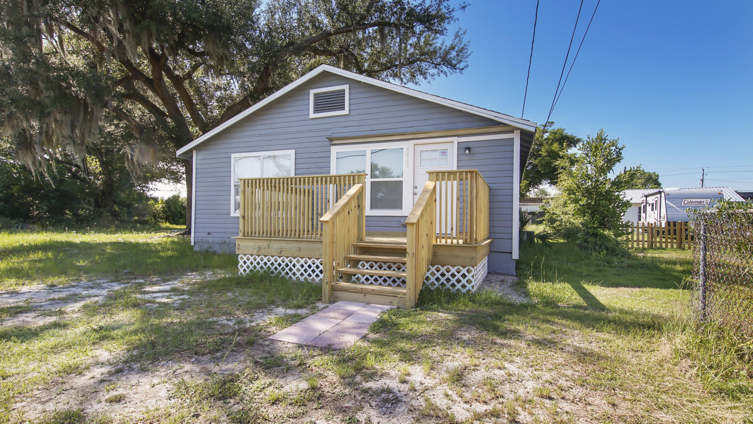 Newly renovated, open floor plan home with convenient proximity to Tyndall Air Force base, beaches, and local hot spots. New electrical, flooring, windows, paint, and more. This home sits on a nice sized lot with front and back patio's, overlooking it's large front and back yards. Come take a look at this cozy home ready for it's new owner.