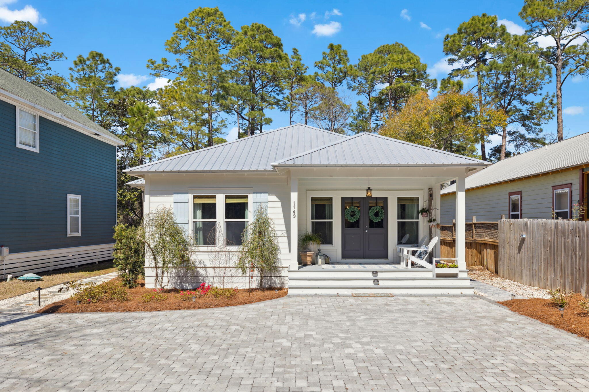 Welcome to your charming Point Washington retreat, beautifully renovated in 2022 to provide the perfect mix of comfort and style! The oversized paver driveway welcomes you to this bright, open home, where a charming front porch invites you inside. Inside, the spacious living room, dining area, and kitchen create a warm and welcoming atmosphere. The kitchen has been beautifully updated with sleek quartz countertops, a stylish new backsplash, and newly painted cabinets, making it the perfect space for both cooking and entertaining. This home features 3 bedrooms and 2 baths, offering both comfort and convenience. The front and middle bedrooms each have large closets and share a tastefully updated bathroom with new tile flooring, a newly tiled frameless shower, and new lighting... The master bedroom, located at the back of the house, showcases a thoughtfully designed interior, a spacious walk-in closet, and a luxurious en suite bath. The master bath features dual vanities, new quartz countertops, new tile flooring, a newly tiled frameless shower, and fresh lighting, creating a spa-like retreat you'll love to unwind in.

A functional laundry room is conveniently located across the hallway from the master bedroom, near the back of the home. Step outside to the screened-in back porch, which overlooks the fenced-in yard, perfect for gardening, outdoor activities, or simply enjoying the peaceful surroundings. 

The backyard is a true highlight, featuring landscape lighting and a stunning 20x27 pool with a tanning ledge and upgraded tile, ideal for relaxing or entertaining guests. A newly installed drip sprinkler system keeps the front and back yards lush and vibrant. Additional features include a custom 10x10 storage shed in the back and an outdoor shower for added convenience.

Freshly painted in September 2024, the home boasts a clean, modern look and is move-in ready. Surrounded by nature, it provides a peaceful and serene living experience.

Ideally located just a half mile from the bay, this home provides easy access to boating, kayaking, and fishing. It's also just a short drive from Eden Gardens State Forest, Grayton Beach State Park, and Point Washington State Forest, where you can enjoy miles of peaceful trails, scenic views, and opportunities for hiking and birdwatching. Plus, you're just a short drive away from Scenic Highway 30A and the stunning beaches of South Walton, perfect for enjoying sun, sand, and surf.