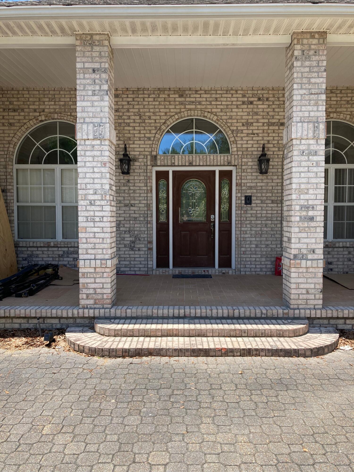 GORGEOUS home on huge lot in Rocky Bayou. This custom home features all the bells and whistles you come to expect in a home of this quality. From the moment you drive up you will experience the quality construction. Grand entrance features high end designer touches as does the rest of the home. Beautiful solid wood flooring in all main living areas. Corner accent gas fireplace is the focal point in the spacious living room. Enjoy the gourmet kitchen with granite surface counter tops beautiful custom cabinetry and large eat in area overlooking the backyard. Stainless appliances including dishwasher, stove, microwave and refrigerator (ice maker not warranted). Master suite is a dream. Master bath features a tranquil whirlpool tub and separate oversized glassed walk in shower. All bedrooms are carpeted and are large enough to accommodate bigger furniture. The laundry room offers a nice stacked washer/dryer (not warranted) & lots of extra storage cabinetry and counter space. Oversized yard and three car garage polishes off this fine home. Owners  will consider pets with restrictions. Any pet must be spayed/neutered, housebroken (no puppies) and current on all shots. There will be a non refundable pet fee required. NO smoking. Any person 18 years old or older must apply separately. Tenants required to carry renter's insurance.