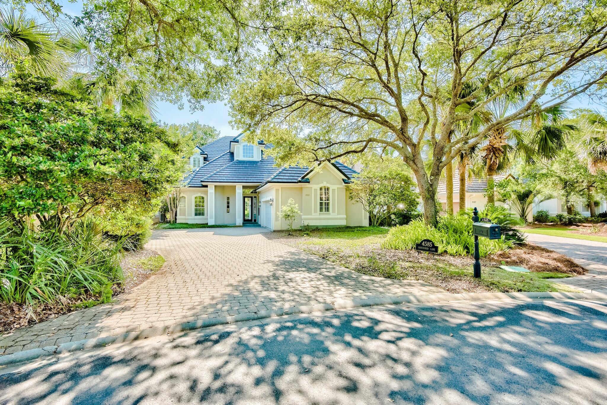 PROFFESIONAL PHOTOGRAPHY COMING* Inside the gates of the celebrated Regatta Bay neighborhood lies this newly updated home with beautiful views overlooking the 4th fairway. A large foyer with soaring ceilings welcomes you inside of this 3 bedroom home which offers a first level master bedroom, a private office which could easily be converted into a 4th bedroom, 2 living spaces, an additional bonus/loft space along with an oversized hobby/storage room upstairs. The home has just been updated with a new roof, a beautifully re-designed kitchen with quartz countertops and new flooring throughout the entire first level. The oversized lot allows for a generously sized cobblestone driveway and around the rear of the home there is plenty of space to add outdoor entertainment or potentially a pool. Located in a 120-acre nature preserve, Regatta Bay is an exclusive residential community with gated entrance, award winning golf, tennis, swimming, boating, dining, and more. The beach, Destin Commons, Lulu's, and the marina are just a short golf cart ride away.