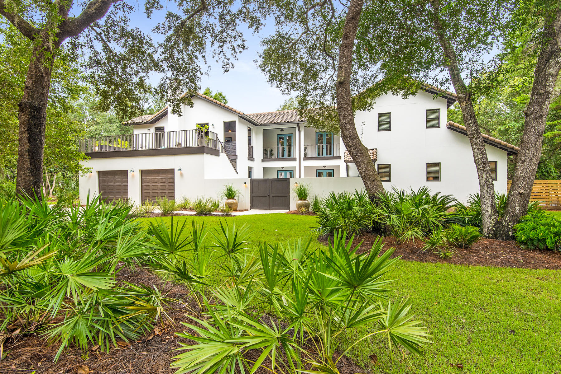 Beautiful Botany Bayou home styled after Alys Beach. Sitting in the premium section of the community and surrounded by $1,000,000 homes,this private cul de sac, corner lot has large oaks, magnolias and pines that add to the park like setting. A covered outdoor living space includes living room/ dining room area with a wood burning fireplace and an additional open air space perfect for star gazing year round.
The courtyard provides privacy for the pool and sunbathing area and includes an enclosed shower. This home was built for entertaining. The open floor plan is perfect for large gatherings. High end appliances and extra large island make the kitchen a foodies dream. This home is a must see. Buyer to verify all measurements.