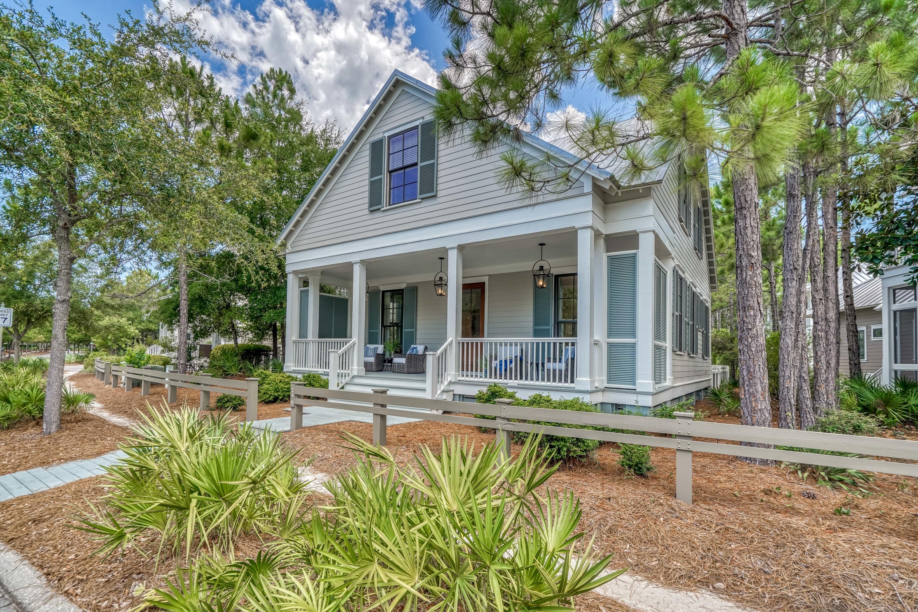 Can you say Wow! A completely renovated home in Phase 2 of Watercolor that has been professionally decorated with amazing attention to detail! This home boasts an impressive Great Room/Kitchen/Dining open concept space with top of the line appliances, Wolf, Bosch and Subzero, Quartz counter tops and Designer light fixtures. Master on the main with a luxurious bathroom that includes a soaking tub and separate shower. Newly added Mud room with Laundry and Lots of cabinets. Sonos Sound System.
Owners have paid special assessment in full. It sits just a few blocks from Camp WaterColor and the Tennis Center and has plenty of parking.
Comfortably sleeps 12 (1 king, 3 queens, and 1 double), great rental property. There are a total of 5 large bedrooms, 4.5 bathrooms. Perfect for Two Families, Lots of owner storage, The private carriage house (queen bed and full bath) above the large two-car garage is ideal for in-laws or elderly parents.

In addition to a large front porch, the home has an expansive screened-in porch in the rear for relaxing, watching TV, entertaining, as well as a fenced-in side yard for Al fresco dining. Side yard and drive way are paved (no gravel). The home is an easy bike ride or walk to the pool, tennis and the beach, as well as Seaside restaurants, grocery store and shops .

During the renovation Kitchen and all bathrooms were upgraded including the cabinetry.  4 New AC systems installed in 2020.