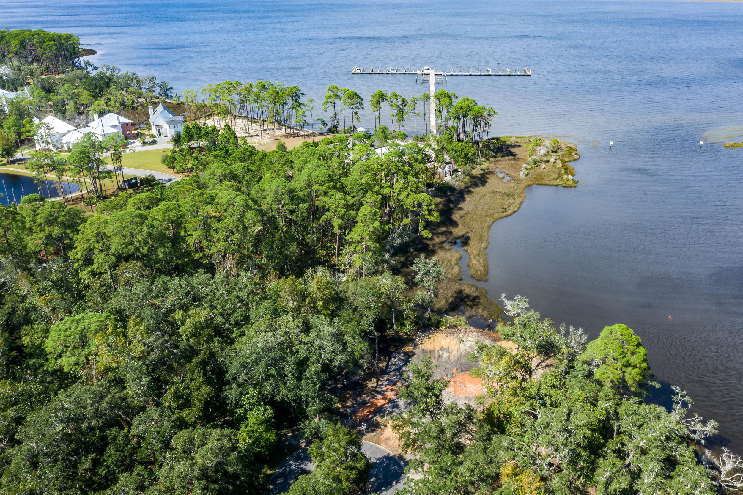 Lots 88 & 89 are combined for extra space and conveniently situated at the end of a cul-de-sac with beautiful bay views. *Ask agent about optional boat slip with the purchase of these lots. 
Tucked away with only native vegetation and the calm waters of Hogtown Bayou in sight, Churchill Oaks offers a lifestyle of elegance and appreciation of nature. Once inside the stately gated entrance, magnificent coastal homes accentuate southern architecture under a canopy of old oak trees.  The 40-acre community is comprised of 87 homesites and some of the best amenities in South Walton.