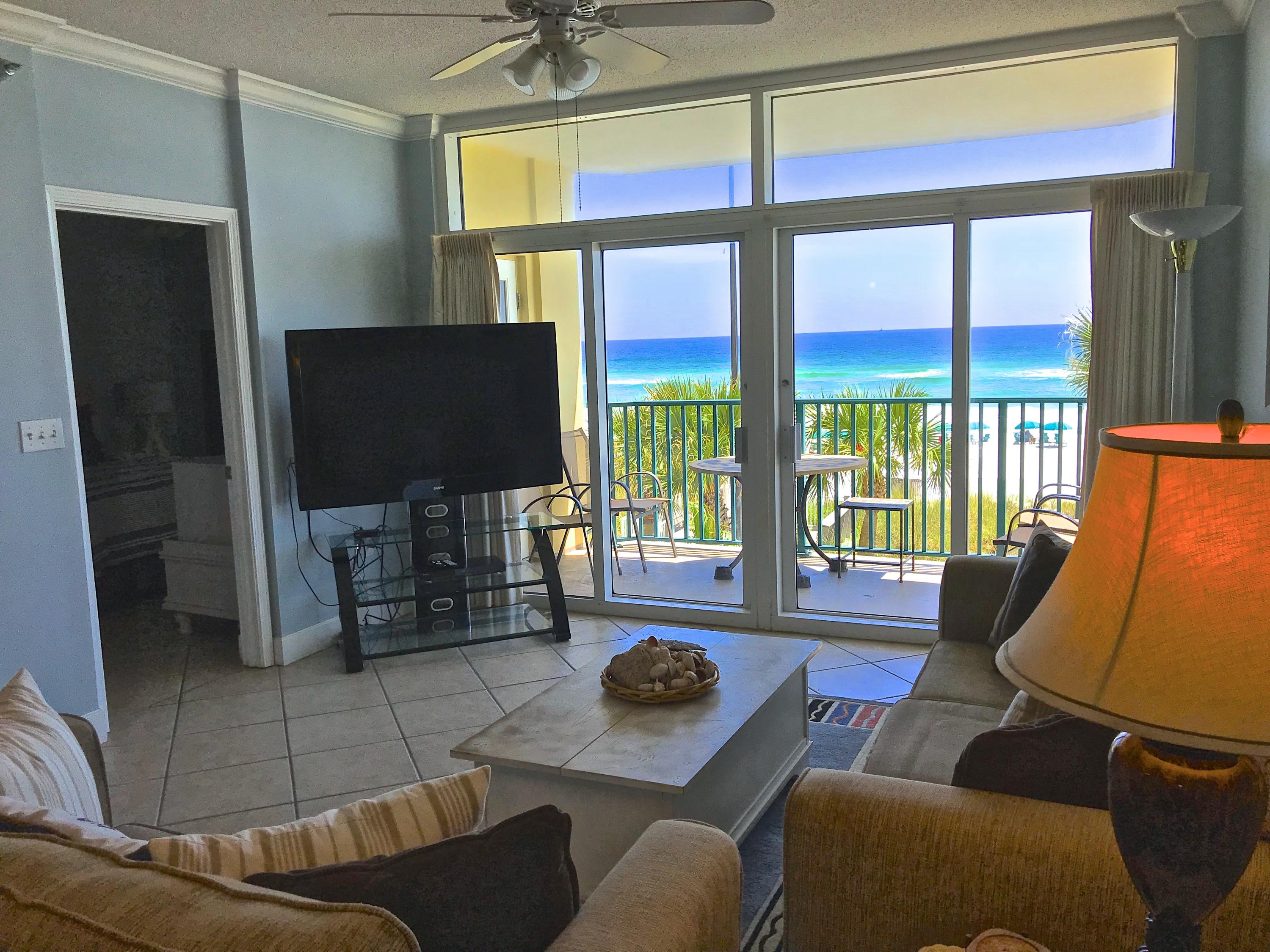 Enjoy being directly on the beach from your balcony,living/dining, or master bedrm..This rare 3rd floor, 2 bdrm/2 bath (1315 sq') condo has been updated with granite countertops & tile throughout!(A/C has been replaced this year too!)The master bath has jetted tub, double vanity,separate shower,& walk in closet. The spacious master bdrm. has king bed & windows galore with direct access to the balcony. The 2nd bedroom has 2 full beds,so unit sleeps 8 comfortably. This unit also has a separate outdoor storage closet & an assigned parking space! Jade East is an upscale, gated,beachfront complex with heated pool, fitness center,tennis, & grilling area. Increase in dues from $2,147 to $3,280. a quarter for roof replacement. Come & enjoy the pristine white beaches & aqua waters of Florida!