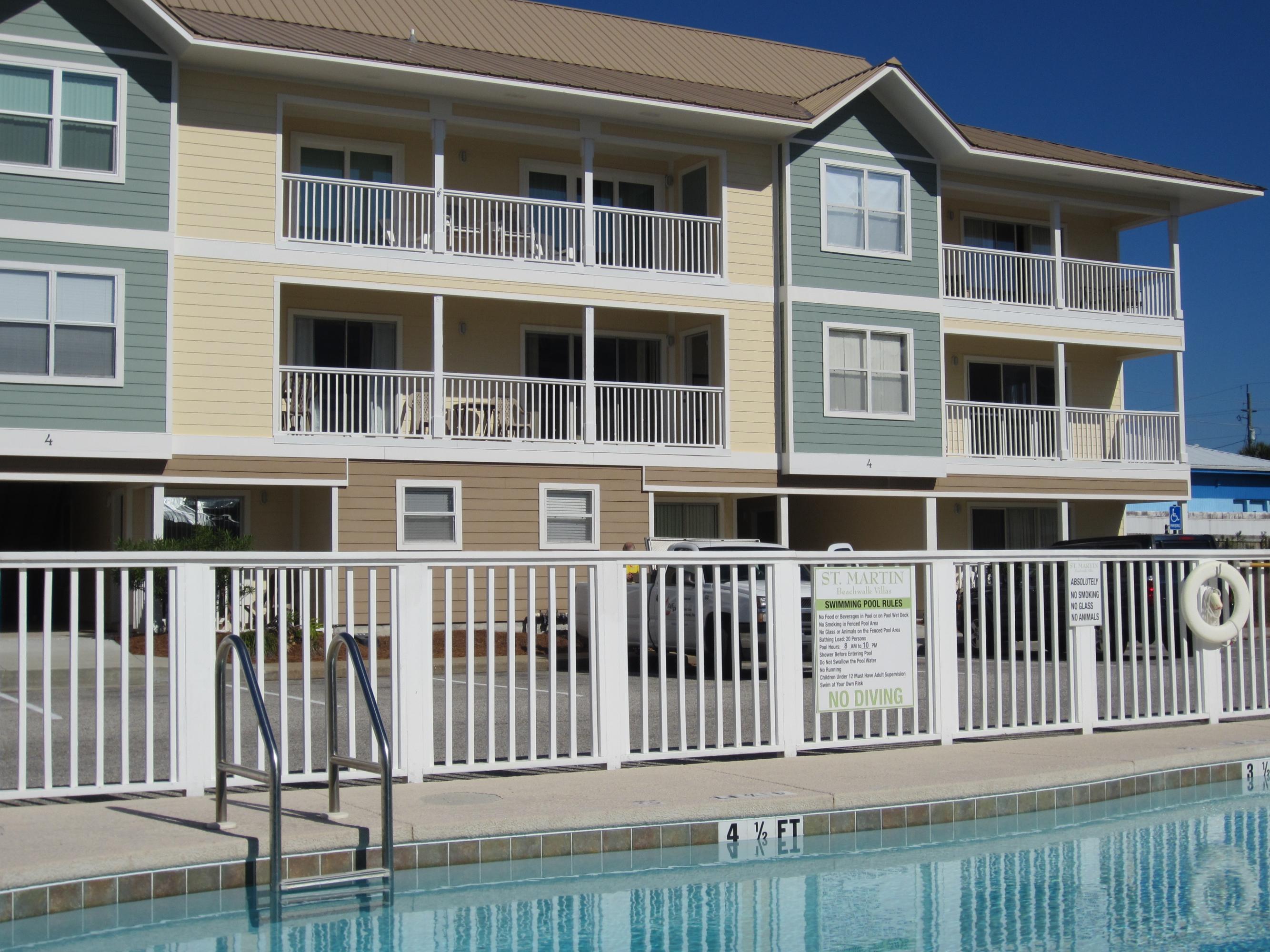 BEST 3 BR VALUE SOUTH OF US 98. From the announcement of this project in 1992, this location has been known as the best 3 bedroom value south of US 98. No major highway to cross to reach the beach, easy walking distance to several restaurants, and directly across the street from the famous ''Big Kahuna's Water Theme Park''. Enjoy a shaded balcony during the late spring to early fall and a sunny balcony during the winter months. The property has recently added a new metal roof, new exterior paint, and the overall property is well maintained. View the many attached photos for descriptions of the property. This second floor condo has a direct view of the pool and clubhouse, Family members can enjoy viewing younger family members at the pool, while relaxing on the shaded balcony. New $4300 Central heating and air conditioning unit installed May 2015 and a new hot water heater in 2014.