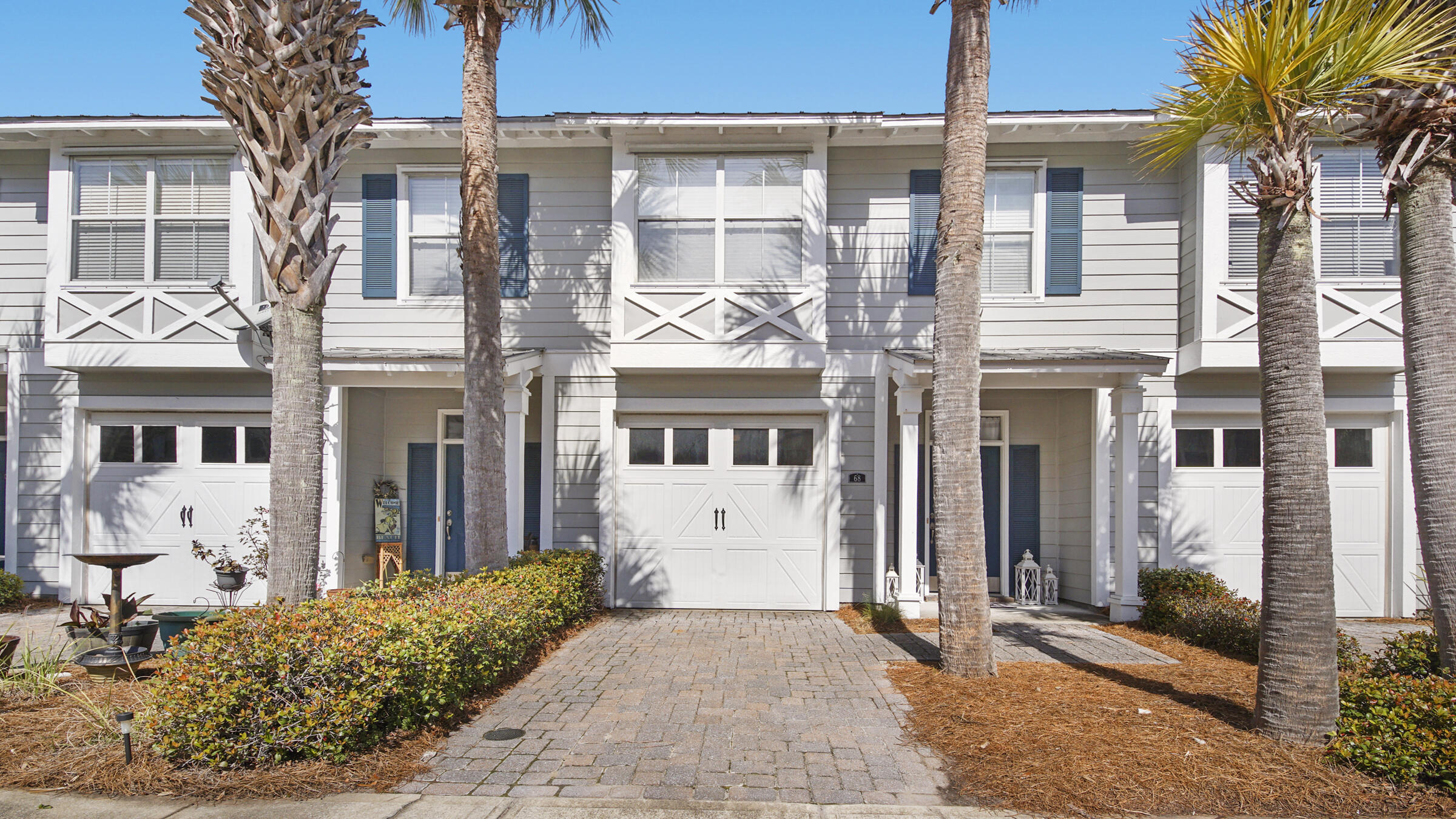 Welcome home! Nestled in a peaceful, well-maintained neighborhood near the bay and the famous white sands and sparkling waters of the Emerald Coast, this 3 bed/ 2.5 bath townhome greets you with 9' ceilings, a welcoming foyer, crown molding and bullnose corners. Enjoy an open, flexible living room/dining room combo with convenient half bath. Steps away, walk into the roomy kitchen equipped with stainless steel appliances, sleek granite countertops, breakfast bar and pantry. Upstairs you'll find the master suite boasting a trey ceiling, a spacious walk-in closet and en-suite bathroom with a double vanity that provides ample counter and cabinet space. Down the hall, you'll find the laundry room, two additional guest bedrooms and a full guest bathroom. Prepare to enjoy the outdoors undern underneath a charming covered patio that backs up to a secluded wooded area. You'll appreciate your very own one car garage and private driveway parking. Zoned for all the A+ rated schools, 5 short miles to scenic 30A, just minutes from the best shopping, dining, and entertainment that the Gulf Coast has to offer. Perfect first home or investment property! Don't miss your opportunity to get this gem!