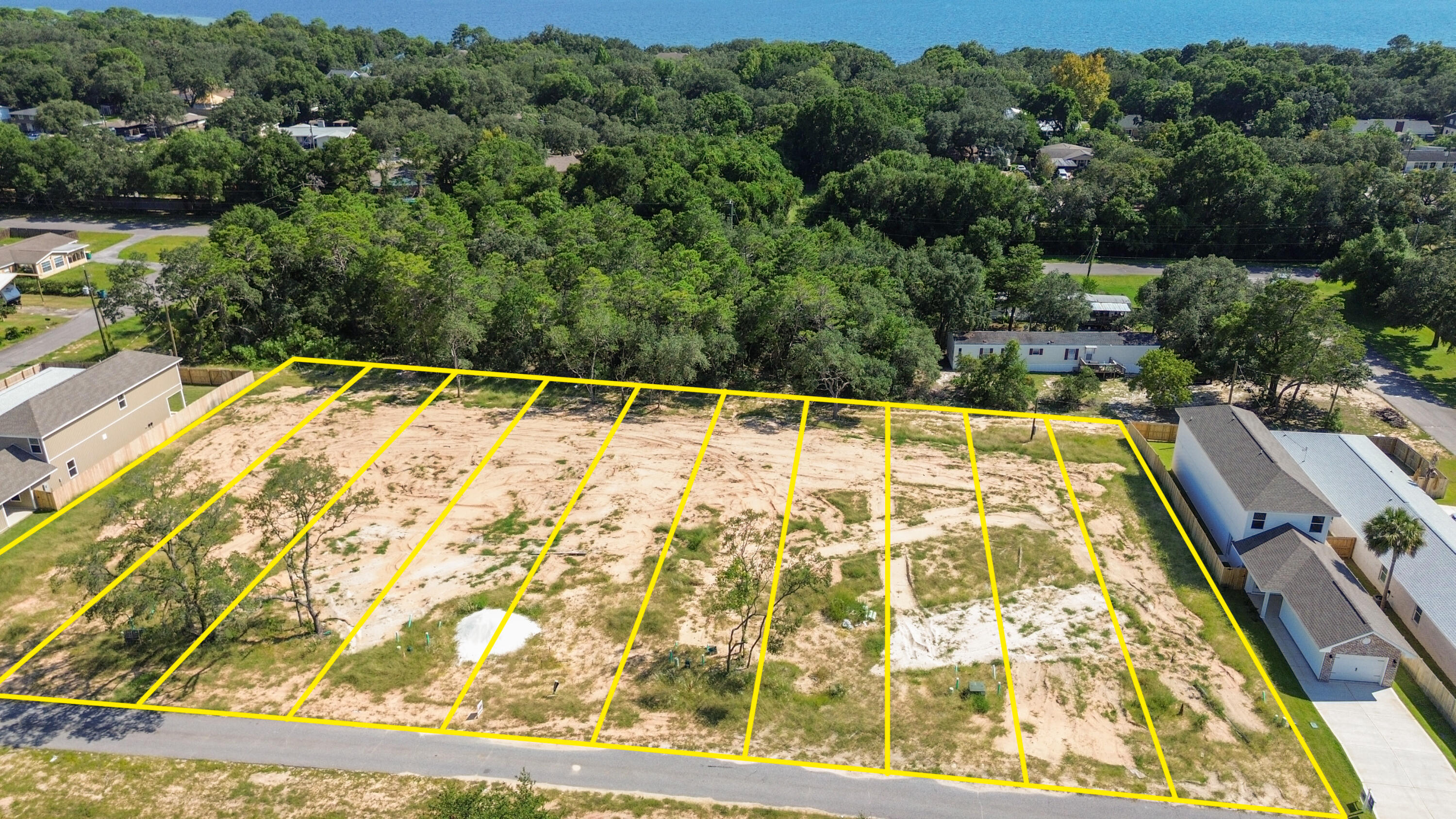Ten recently developed residential lots available for sale, located along 10th Street. All lots are situated in Flood Zone X (no flood insurance required) and come with public water and sewer connections already in place. Water tap fees have been paid, saving future owners thousands in upfront costs.

Addresses include:

112, 114, 116, 118, 120, 122, 124, 126, 128, and 130 10th Street.

These parcels are ready to build, ideal for investors, builders, or buyers seeking new construction opportunities in a well-established area.