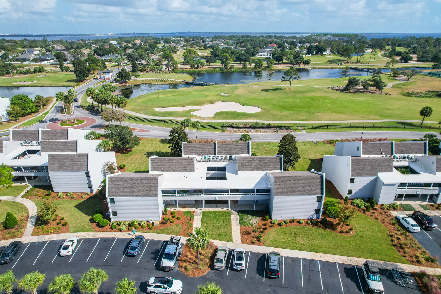 Owner Financing available with 30% Down; 4% interest Rate, amortized over 30 years with a 3 or 5 year balloon.  Newly renovated 2nd floor Condo in the gated community of Bay Point Harbour Villas.  Spacious 900 square foot home with one bedroom/one bath plus and enclosed porch area you can use as an office or extra living space that overlooks the Golf Course.  Luxury Vinyl Plank flooring throughout with tile in the kitchen and bathroom.  The kitchen has granite countertops and a breakfast bar, there is a stackable washer and dryer in the home. A new HVAC unit was installed in 2021.
