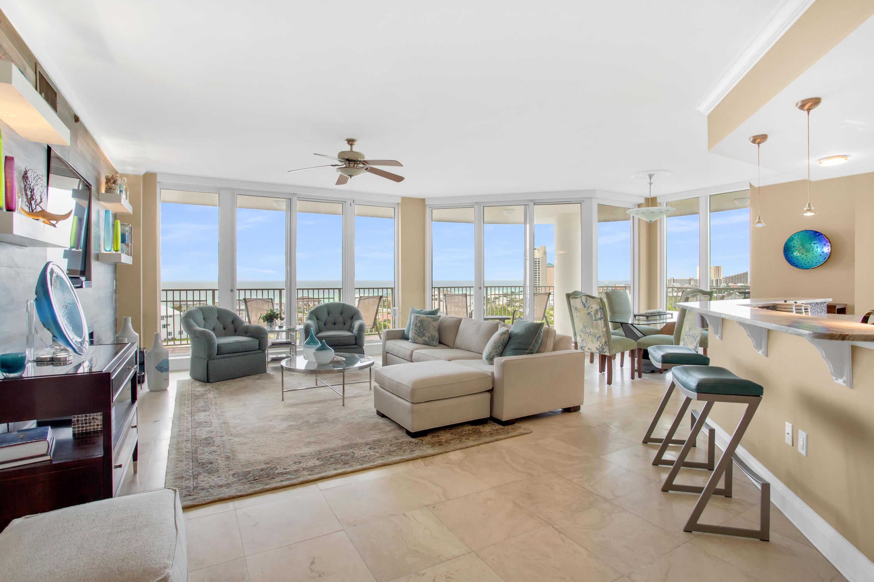 Immerse yourself in views from this 9th floor private residence located in the exclusive One Beach Club Drive condominium. The current owners spared no expense in updates, from contemporary power shades on the south facing windows to a Toto Neorest automatic toilet/bidet in the Master Bathroom. The spacious floor plan encompasses four bedrooms, four updated bathrooms, an open living area with expansive views of  the beach, and a fully remodeled kitchen. The kitchen was extensively upgraded in 2015 and features an Electrolux stove, oven, and microwave, Kenmore double drawer dishwasher, and Samsung refrigerator.  The living room exemplifies luxury with a focal wall that includes up-lit floating shelves, inset flat screen TV, and electric fireplace. Relax and refresh in the Master suite. Take in the view from bed while enjoying your morning coffee before getting ready in the large master bath featuring a soaking tub, spacious walk-in shower, and Toto Neorest automatic toilet/bidet. All three guest bedrooms have unparalleled views of the Sandestin Golf and Beach Resort, Choctawhatchee Bay, golf courses and lakes, each with its own entrance to a large balcony. With 670 sq ft of balcony space, there is enough room for you and your guests to enjoy a sunrise and sunset. Carpet in all the bedrooms was replaced in 2019 along with the HVAC system.  One Beach Club Drive is a rental restricted condominium. Private building amenities exclusive to One Beach Club Drive include assigned parking in a covered garage, two tennis courts, a large lagoon-style pool surrounded by private heated and cooled cabanas, an outdoor kitchen, two guest suites, a media room, a social/game room with catering kitchen, a well-equipped fitness center, and more. Each unit transfers with a membership in Sandestin's private Beach Club which is adjacent to the property.

One Beach Club Drive is a rental restricted condominium. Private building amenities exclusive to One Beach Club Drive include assigned parking in a covered garage, two tennis courts, a large lagoon-style pool surrounded by private heated and cooled cabanas, an outdoor kitchen, two guest suites, a media room, a social/game room with catering kitchen, a well-equipped fitness center, and more. Each unit transfers with a membership in Sandestin's private Beach Club which is adjacent to the property.

As an introduction to the Sandestin lifestyle, we invite our new owners to explore amenities that make Sandestin special. The listing brokerage and seller(s) are presenting the buyer(s) of this property with (2) 90-minute rounds of Tennis court time, a golf foursome at one of our three championship courses, and a round of golf for up to four (4) players at the unrivaled Burnt Pine Golf Club.

Sandestin Golf and Beach Resort is a major destination for all seasons and all ages, and has been named the #1 resort on Florida's Emerald Coast. This magical resort spanning over 2,000 acres is comprised of over 70 unique neighborhoods of condominiums, villas, town homes, and estates. The resort features miles of sandy white beaches and pristine bay front, four championship golf courses, a world-class tennis center with 15 courts, 4 resort swimming pools (and 15 private neighborhood pools), a 123-slip marina, a fully equipped and professionally staffed fitness center and spa, meeting spaces and The Village of Baytowne Wharf, a charming pedestrian village with events, shopping, dining, family entertainment and nightlife. For true golf cart community living, Grand Boulevard is just outside the resort gates and provides access to additional shopping, dining and entertainment all without traveling on Hwy. 98. Come to Play, Stay for Life!