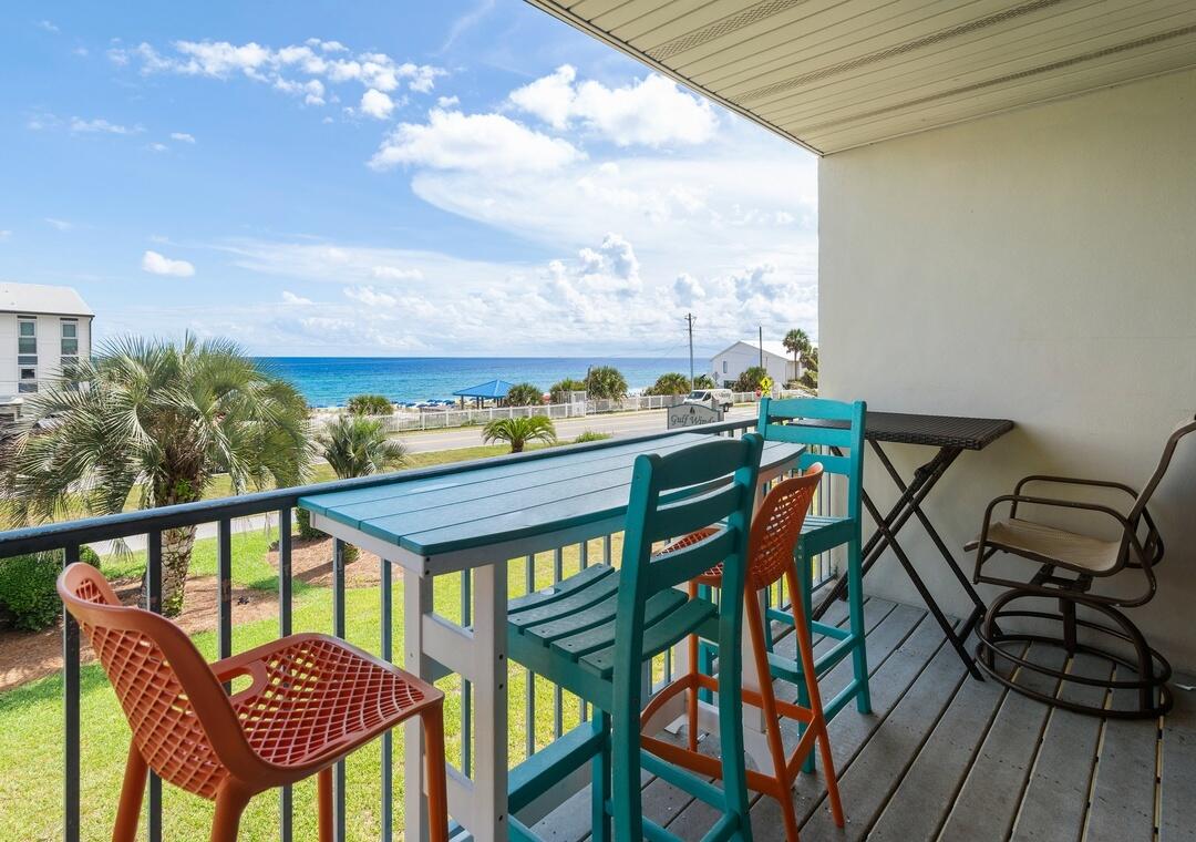 Close to everything, far from ordinary. 4 Gulf Winds East townhome is a 2-bedroom w/bunks & 2.5 baths located in Miramar Beach. The unit features 4 balconies/patios, 2 of which face the Gulf, with views from the living area, dining area, and primary bedroom. Interior features include smooth ceilings throughout, painted in neutral colors, ceiling fans, and updated lighting and plumbing fixtures. All 4 sliding glass doors have been replaced. The foyer, kitchen, dining area, hall, and living area have tile flooring; the full baths have Luxury Vinyl Plank (LVP). The second-floor living area has Gulf views and access to a south-facing covered 6' x 18' balcony. The dining area is open to both the living room and kitchen and includes a small workspace with a desk, and access to a 4th balcony. The kitchen has ample cabinetry, granite countertops, and a new refrigerator, microwave, and garbage disposal. The 1/2 bath and an additional closet are also on this level. The 1st-floor primary bedroom has Gulf views and access to a covered patio. The en-suite bath includes a double-sink vanity, tiled shower w/glass door, and updated fixtures. The 2nd bedroom includes 2 built-in bunks, an en-suite bath with updated countertops, tub/shower combination, and fixtures, and access to its own balcony with an exterior storage closet. The washer/dryer, water heater, AC, & owner's closet are also on this level. Gulf Winds East has a community swimming pool plus 150 feet of private deeded beach access to the Gulf of America that is gated with a gazebo directly across the street. Centrally located, is a short distance to everything Miramar Beach/Destin has to offer! MFD on A/C 10/2021, MFD on HWH 4/2019. 2024 Rental Revenue	$36,530.19 & 2025 Rental Revenue $45,038.77