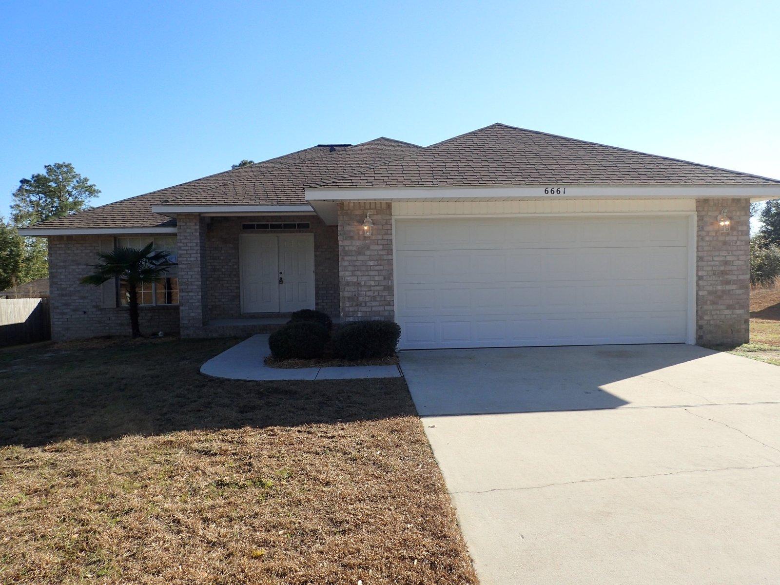 You will not want to miss this amazingly priced REO property! This home is located convenient to City of Milton and interstate in the Woodbury Forest Subdivision. built in 2006, this all brick home has 2 car garage, covered patio and porch and privacy fenced back yard. Home has large open living room area with coffered ceilings, breakfast nook, separate dining area with chair rail and open concept kitchen will all appliances. Home has new carpet, paint and is ready for new owners. A definate must see! Call today before it is gone!