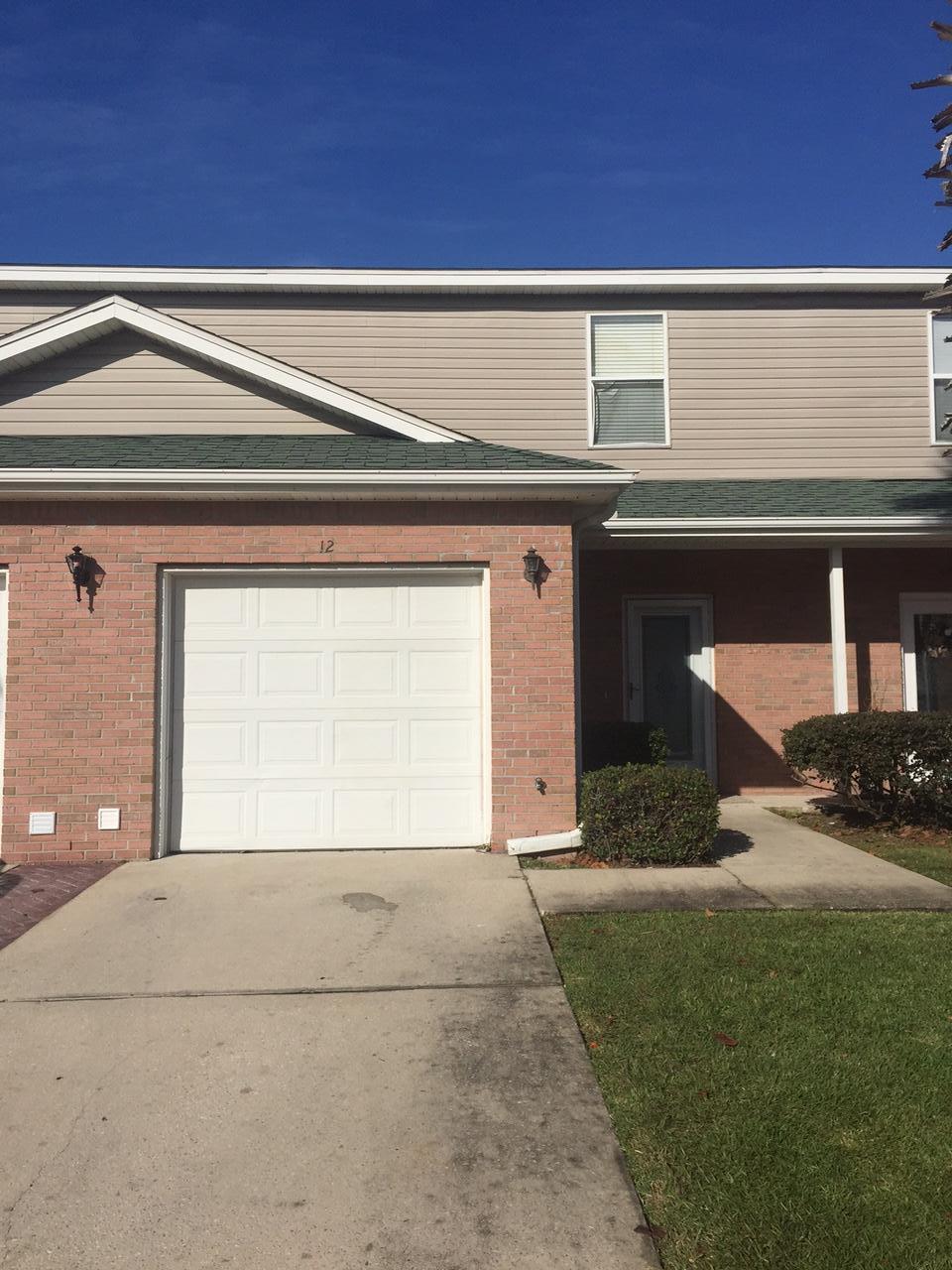 Conveniently located town home in the heart of Destin. This unit features tile floors throughout the main level and new frieze carpet upstairs. The home has been freshly painted and is ready for immediate occupancy. A sliding glass door opens to a covered deck out back. Lawn maintenance is included in the HOA assessment as well as access to the community pool. Call today to schedule your appointment to see this home.