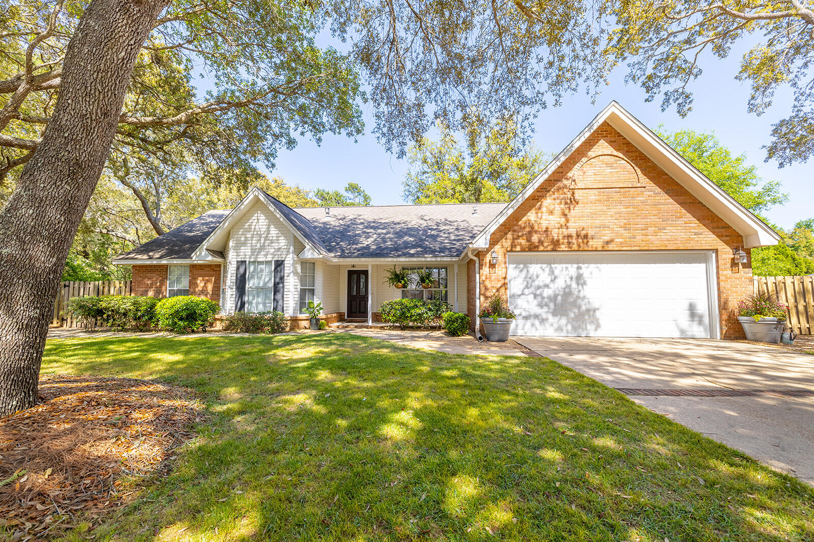 This beautiful home with wonderful covered front porch is situated in the sought after gated community of Southwind, in Bluewater Bay on a quiet  cul-de-sac, just shy of a half-acre lot with a privacy fenced backyard! The front and backyard have been professionally landscaped and comes equipped with a sprinkler system.

This beautiful home boasts a spacious kitchen with ample counter space, perfect for hosting  gatherings and entertaining friends. You'll enjoy the stainless appliances, ample cabinetry for storage and large working island for meal prep. There is a gorgeous Japanese maple tree just outside the dining nook area that is breathtaking with its rich red leaves.

Throughout the downstairs main living area, you will enjoy the tile flooring which adds a touch of elegance and is easy to maintain. Natural light streams through large windows throughout, creating a warm and inviting atmosphere. and inviting atmosphere. 

The living room boasts vaulted ceilings and a cozy fireplace, making it the perfect place to relax and unwind. The layout and high ceilings create a spacious and inviting atmosphere, perfect for entertaining friends and family. There is a rear door to the backyard and patio, perfect for a summer BBQ!

The dining room is just off the main foyer is a great spot for entertaining. This area could also be closed off for an office or playroom if needed.

The master bedroom is nestled in the back of the home with private views of the huge backyard. The master bathroom could use some updating, but currently has a soaking tub, walk-in shower and 2 separate vanities. This bathroom has a lot of potential!

The home also features three bedrooms located on the lower level, providing privacy and separation from the main living area. Whether you're looking for a quiet retreat or a place to host guests, these bedrooms are the perfect solution. 

Heading upstairs to the 4th bedroom you will be pleasantly surprised by a loft area which makes the perfect game or office space. The 4th bedroom is large and has a private 3rd full bathroom and separate closet space.

The large laundry room is tucked behind the kitchen and has recently undergone a remodel. This space has ample room for hanging laundry, folding clothes, and plenty of room for storing additional items. There is even a laundry sink!

Overall, this home is a perfect blend of style and functionality, with all the modern amenities you need for comfortable living. 

Roof was replaced in 2012, HVAC and gas furnace is 2015, gas water heater 2021.