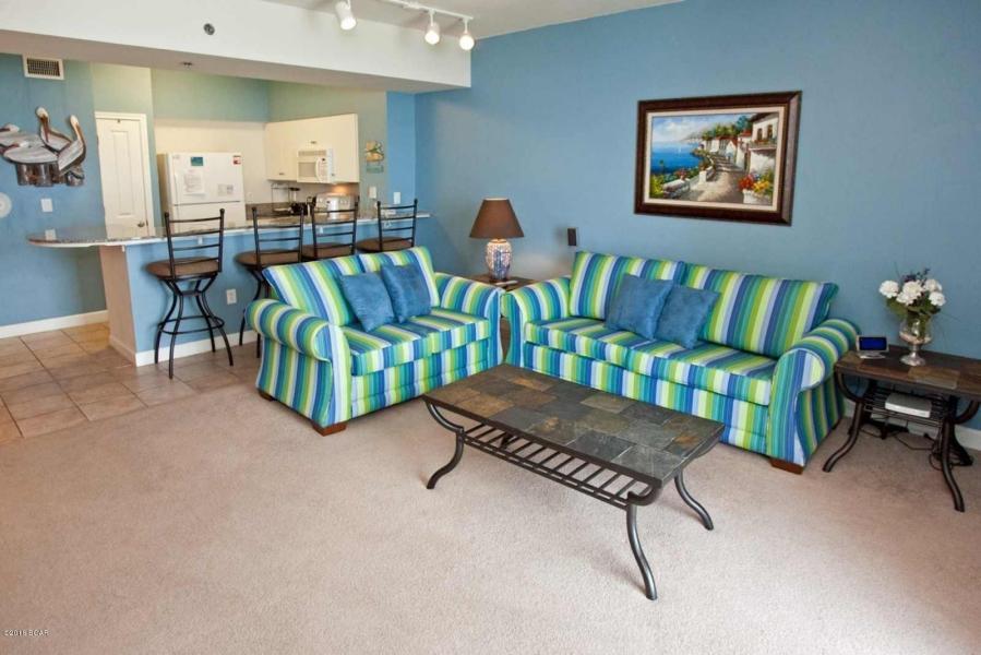The beach getaway you've been dreaming of at the popular resort destination - Shores of Panama! This beach inspired 1 bedroom + bunkroom, 2 bath Gulf front condo conveys fully furnished. Incredible views from this coveted '12 stack location. This spacious 907sq.ft., ''Type C'' unit features the kitchen open to living area and master bedroom on the Gulf. Sleeps 6 including bunk room. Sunshine and warm gulf breezes abound from the unit's large, wide balcony.