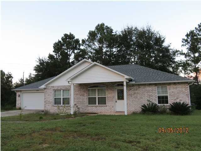 Available 06/06/2016.....Cute South of I-10 home. 3/2 Split floor plan home has many upgrades and lives large for 1265 square feet. Laminate and tile flooring in the main areas. Upgraded light fixtures, appliances and fenced back yard. Nice deck for entertaining or just relaxing in the evenings in a very private environment. 2 car garage. Easy access to all bases, beaches and shopping. No inside smoking. Pets may be allowed with a $400 non-refundable pet fee.