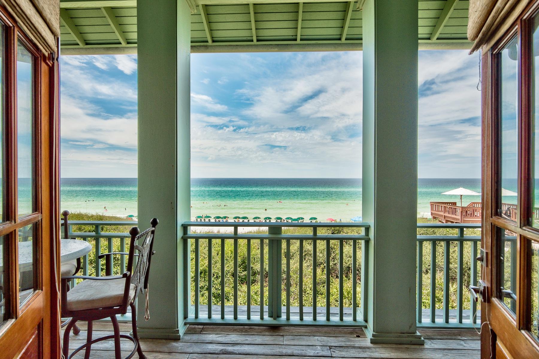 Extraordinary architectural detail juxtaposed endless gulf views characterize this prominent beachfront residence, designed by Tom Christ, ideally located near the eastern green in Rosemary Beach. This exceptional coastal cottage is situated on 34' of premium gulf frontage, tucked away just one tier east of the beach walkover as well as both privacy and serenity as well as excellent proximity to amenities such as the Rosemary Beach tennis courts & fitness center as well as one of many community pools. Thoughtfully designed, this property is comprised of both a main house and a carriage house with fortified poured concrete construction on the first level and wood frame construction on the second level. The well-designed floor plan allows three full bedroom suites and two king-sized loft areas. This residence has been recently remodeled with notable upgrades such as gray-washed beamed ceilings in both the main house and carriage house, fresh interior paint and new furnishings. Other notable features include a two-car garage with an additional parking pad and interior storage, 10' ceilings on the first level with 15'+ vaulted ceilings on the second level, master bedroom on the first floor with full kitchenette and ensuite bathroom offering dual vanities, walk-in shower and gulf views. The inverted living area occupies the second story and is highlighted by soaring vaulted ceilings which perfectly frame beautiful gulf views as well as a floor-to-ceiling gas fireplace highlighted by pecky cypress ship-lap. The galley-style kitchen is open to both the dining & living area and has been masterfully equipped with stainless steel appliances, granite countertops, custom cabinetry and ample windows allowing cascading natural light as well as pristine water views. Rosemary beach defines new urbanism living and is characterized by stunning european architecture and an abundance of well planned upscale common areas & amenities. This property is perfectly poised to enjoy all of the world class shopping, dining and entertainment Rosemary Beach has to offer as well easy access to all of the outstanding communities located along 30A.