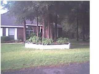 ALL BRICK HOME IS NESTLED AMONG THE LARGE OAK TREES ON A .47 ACRE LOT IN INDIAN TRAILS. 9' CEILING ENHANCES THE FOYER AND DINING AREA. GAS LOG FIREPLACE WITH BRICK CUSTOM-MADE MANTLE COMPLIMENTS LARGE 15' X 20' LIVING ROOM WITH CATHERDAL CEILING. MASTER BATH W/6' X 10' WALK-IN CLOSET. FRENCH DOORS LEAD TO THE 12' X 18' REAR WOODEN DECK PIPED FOR NATURAL GAS TO MAKE THOSE WEEKEND BARBECUES A BREEZE. MANY UPDATES SINCE BUILT IN 97 INCLUDING STORM DOORS ADDED TO GARAGE AND FRONT ENTRANCE. SPRINKLER SYSTEM FOR SHRUBS; ALSO A BRICK MAILBOX. Please call and ask for Celeste for showing instructions.