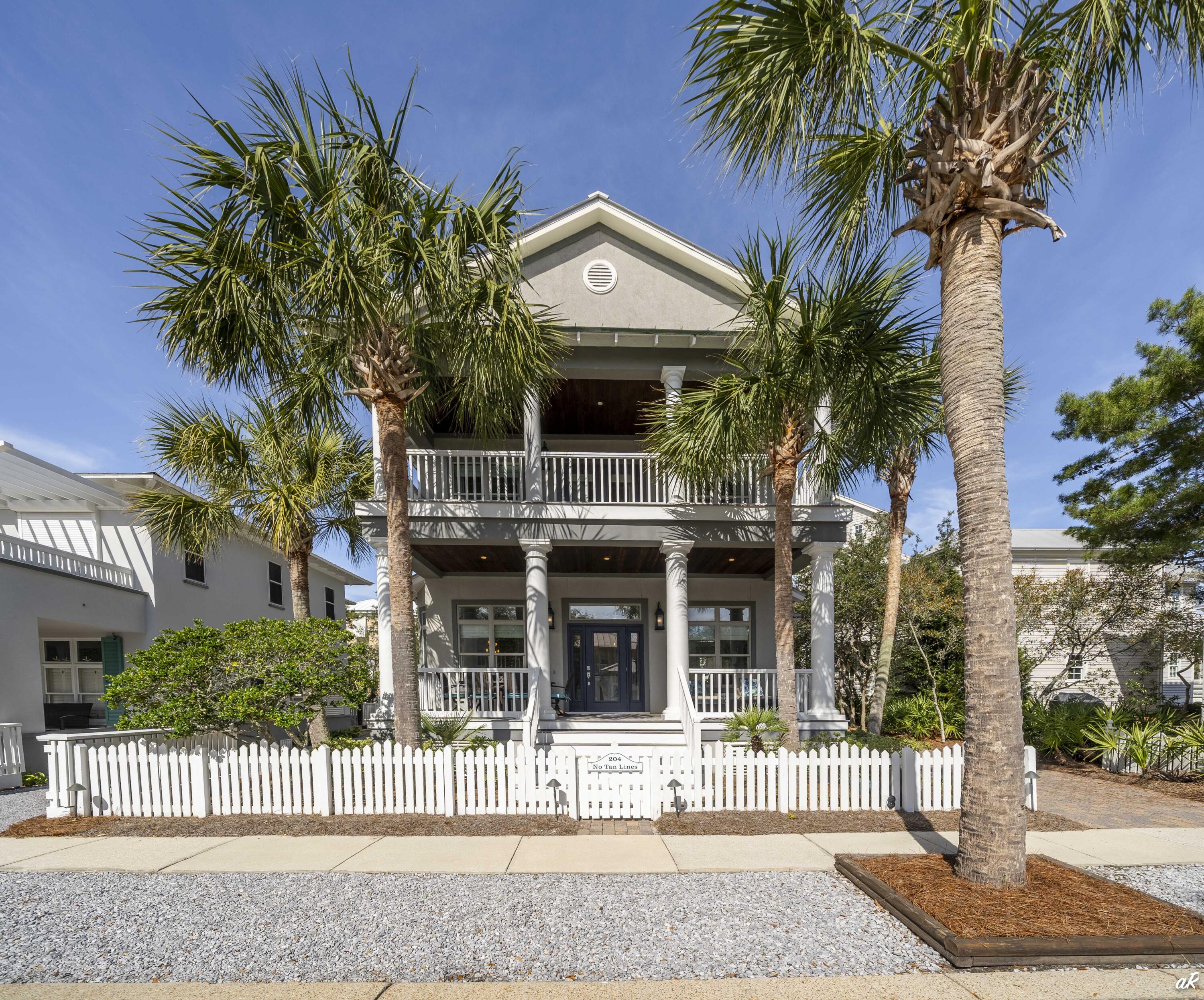 ''No Tan Lines'' is located on the quiet and serene Dunecrest Lane. This house is tucked into lovely native pine and oak trees. It is three stories, three bedrooms, built-in bunk beds off the second floor hallway and tower (3rd floor) with great views of the Gulf of Mexico. One of the bedrooms is so large that it has ample space for two queen beds. The double loaded front porches are spacious and shady - perfect for visiting, reading, or just enjoying being at the beach. The handy side porch and door, off the driveway, lead directly into the kitchen for ease in unloading groceries and luggage. According to the Design Review Board, the lot is large enough to build a guest house or a pool. All plans need approved by the DRB. The Dunecrest walkover is seconds away  from this nicely appointed home. Nicely maintained and furnished, this property is ready for your beach home or as a rental property - move-in ready.
