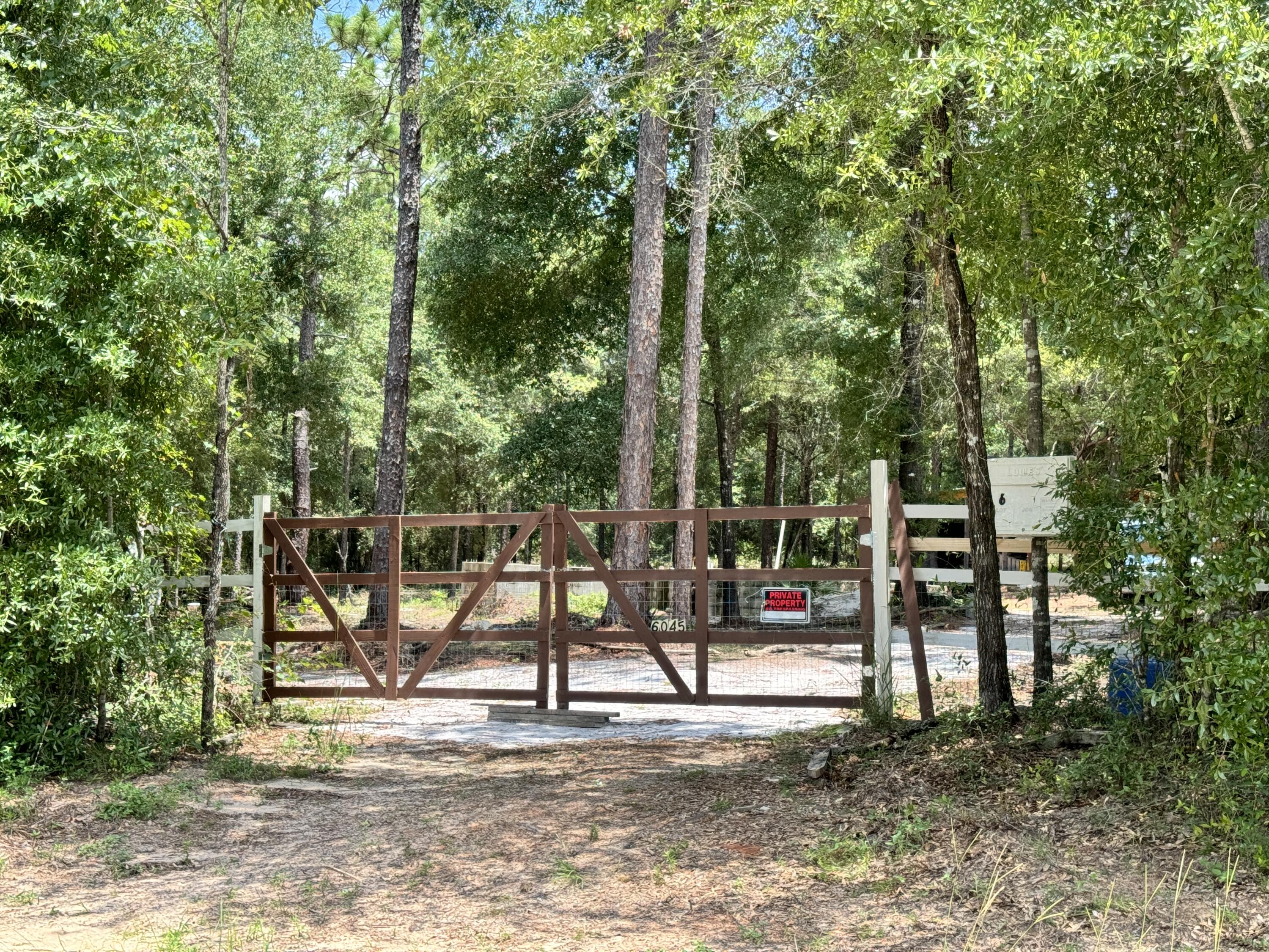 This is your chance to build your new home and build equity in this fast growing area.  Cleared Lot, Fully Fenced, Foundation already in place with house plans available (2 bedroom, 2 bath, island kitchen) or demo the foundation and start again with your own floor plan, storage barn just needs to be closed in. Water meter already in place. Previous survey, before improvements, is available. Lot cannot be split.