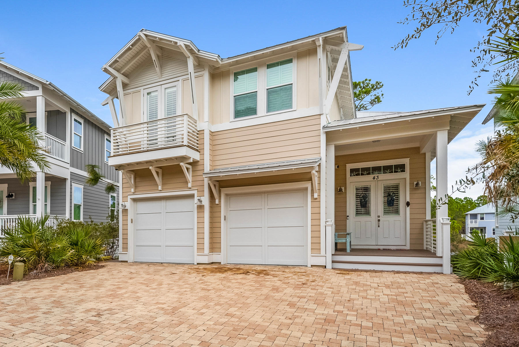 2015-built coastal cottage embodies the seaside lifestyle, Blue Mountain Beach's natural beauty, and the distinctive culture of Highland Parks. Highland Parks is a one-of-a-kind community nestled between the beach and 15,000-acre Point Washington State Park. This premium lot backs up to the state forest and is a short walk to the community pool. Views of the pond and fountain can never be obstructed. This home's ''Catalina'' floor plan is the largest in the neighborhood and features numerous upgrades. Its 2-car garage with a large driveway is very rare in this area. The epicurean kitchen is designed for feeding and entertaining crowds with granite counters, 6-seater island, 5-burner gas cooktop, GE Cafe appliances, and large pantry. Sold mostly furnished with a few exceptions. The master offers peaceful tree top views, private balcony, 2 walk-in closets, and en suite with double vanities and walk-in shower. Outstanding features include: smart home-security equipped; 8-ft doors; impact glass windows; custom plantation shutters; multiple decks and screened-in porch; wood look tile; outdoor shower; fireplace with custom solid hickory mantle; and under house enclosed storage. Sold unfurnished. Custom solid wood Amish-made furniture can be purchased separately. Highland Parks in 30A's Blue Mountain Beach offers a resort style pool with waterfalls, hot tub, gas firepit, and poolside pavilion with summer kitchen, grilling area, and big screen TV.