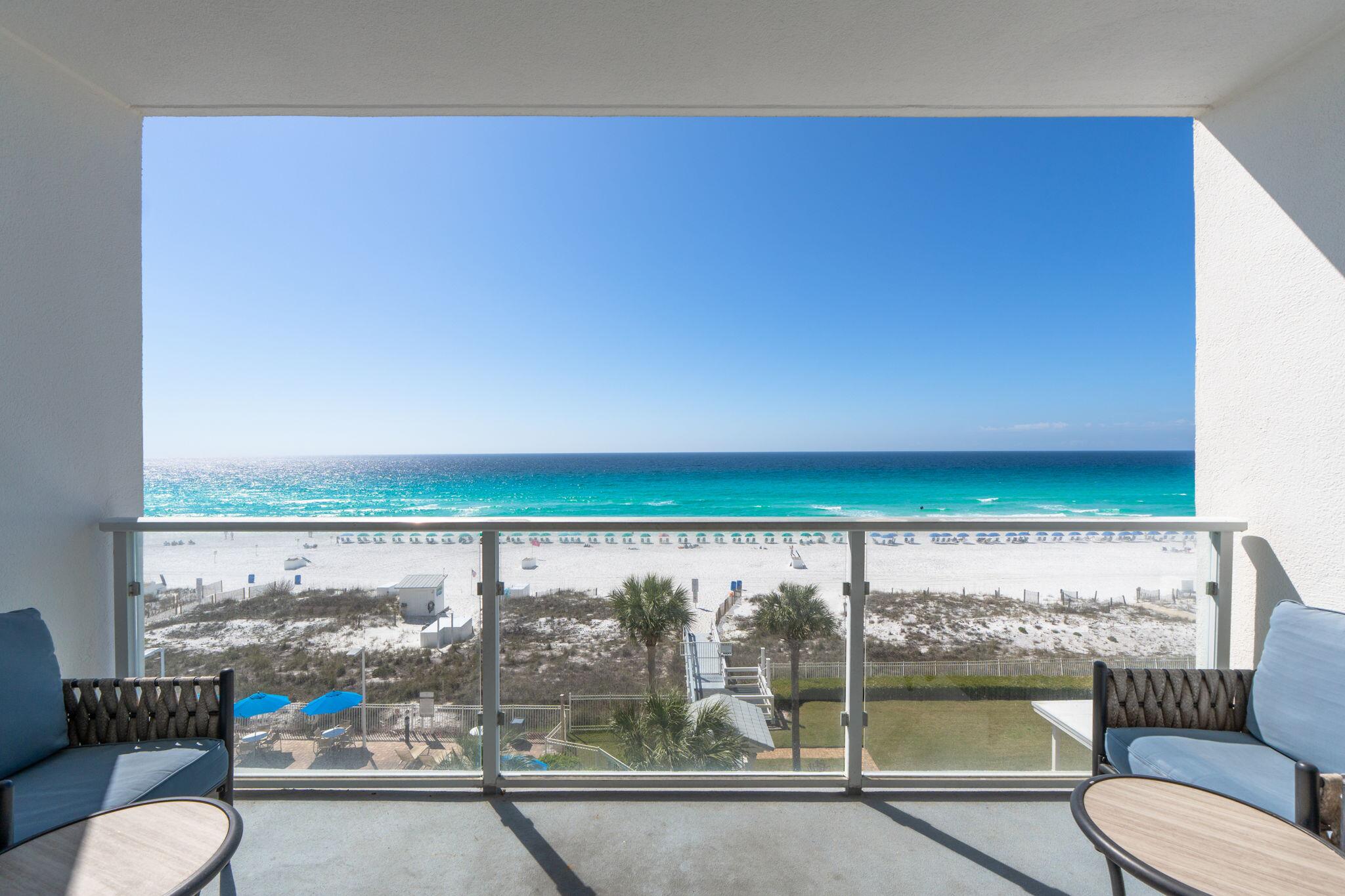 Rare opportunity in the desirable Sterling Sands Condos with GORGEOUS unobstructed gulf-front views.  This 4th floor beautifully updated unit has an open floor plan with views directly overlooking the white sand beaches and emerald coast waters.  Kitchen has granite countertops, and stainless appliances, breakfast bar seating as well as a dining table area.  2 bedrooms and 2 full bathrooms, one with king size bed, and the guest room holds bunk beds with a twin on top and a full on bottom.  Extra sleeping space with pull-out couch in living area.  Full-size washer and dryer in unit. Sterling Sands has a Gulf-front community pool with hot tub, gym, daily beach service and grilling area to enjoy. Come enjoy the 460 feet of waterfront views that Sterling Sands has to offer.  This property is a great investment property with rental history and projections in the MLS. Call today to schedule a tour of this property.  Recent upgrades include new windows and doors in January 2026, HVAC in 2020.