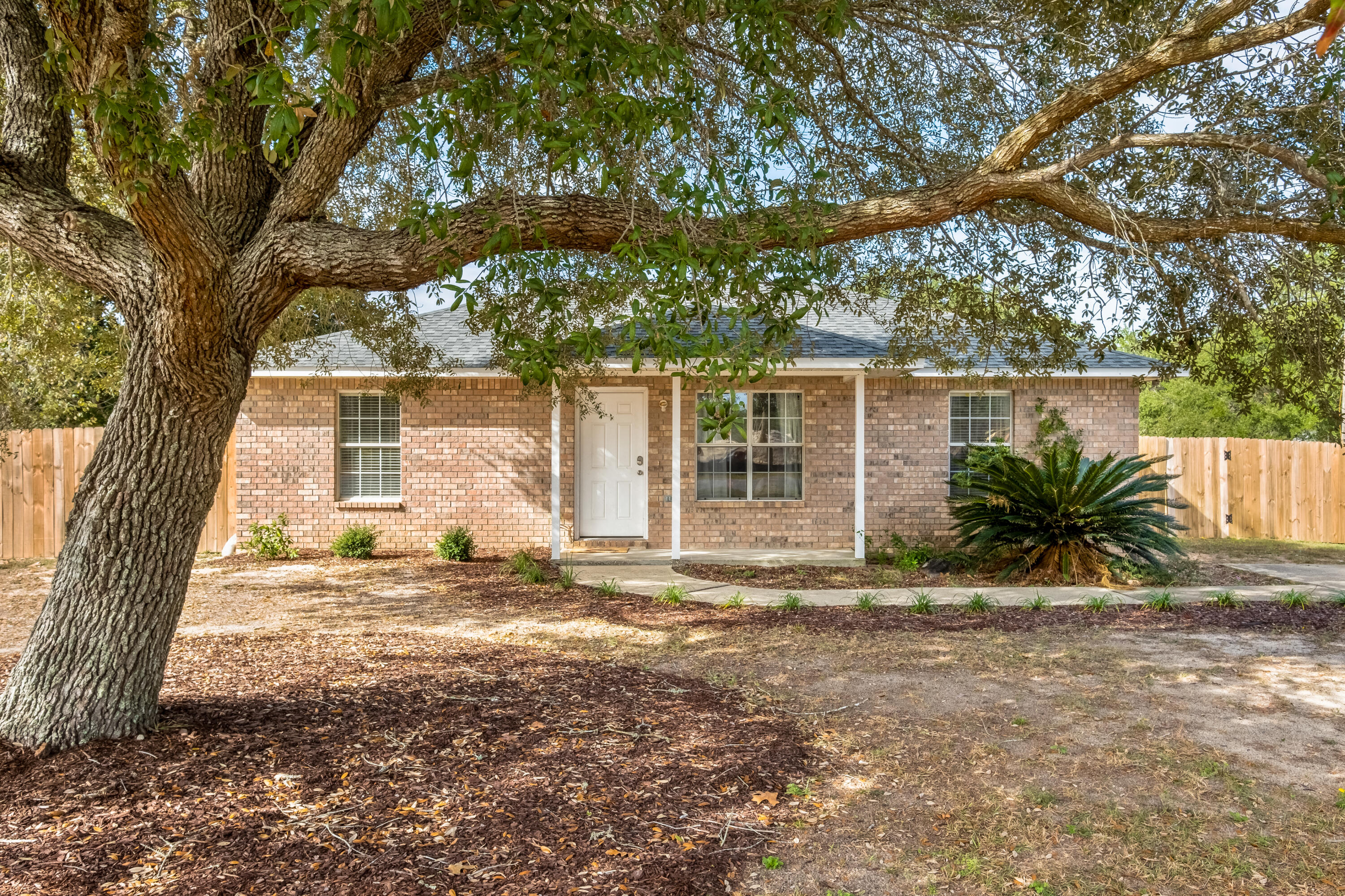 Charming 3-bedroom, 2-bath brick cottage in the heart of Midway, located within the highly sought-after Gulf Breeze A-rated school district. This well-maintained home features a modern kitchen with stainless steel appliances, granite countertops, and a bright, open layout. Enjoy tile and LVP flooring throughout—absolutely no carpet! The fenced backyard offers privacy and space to relax or entertain.

Additional perks include HVAC air filter delivery, pest control, and lawn mowing provided by the owner. Pets may be considered with owner approval, a non-refundable pet fee, and monthly pet rent. Renter's liability insurance is required. No SMOKING. Home is occupied until Aug 6 2025. This home offers comfort, convenience, and thoughtful extras in a great location.