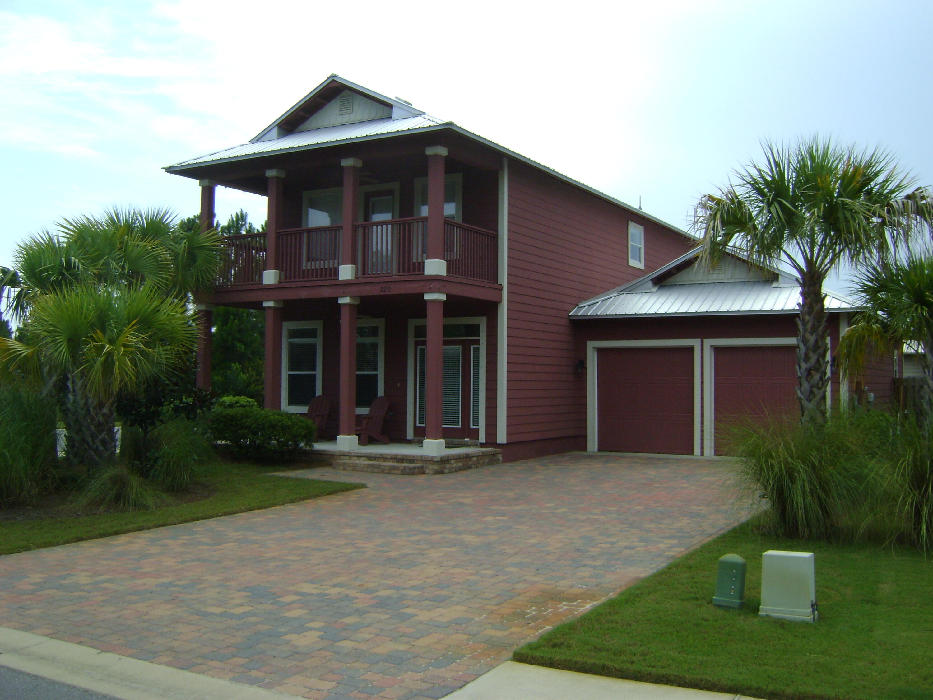 4BR/3.5 BA!!- wonderful new neighborhood with the popular Florida Cottage style homes. This home has TWO Master Suites and TWO Fabulous porches with ceiling fans for enjoying the coastal breezes!! Also - hard to find - TWO Car Garage as well as hardi board siding, metal roof and brick paver driveway!!! Also, granite kitchen countertops, lots of 18'' ceramic tile, stainless steel appliances, freize carpet and much more!! Public Bay access - just one block away!