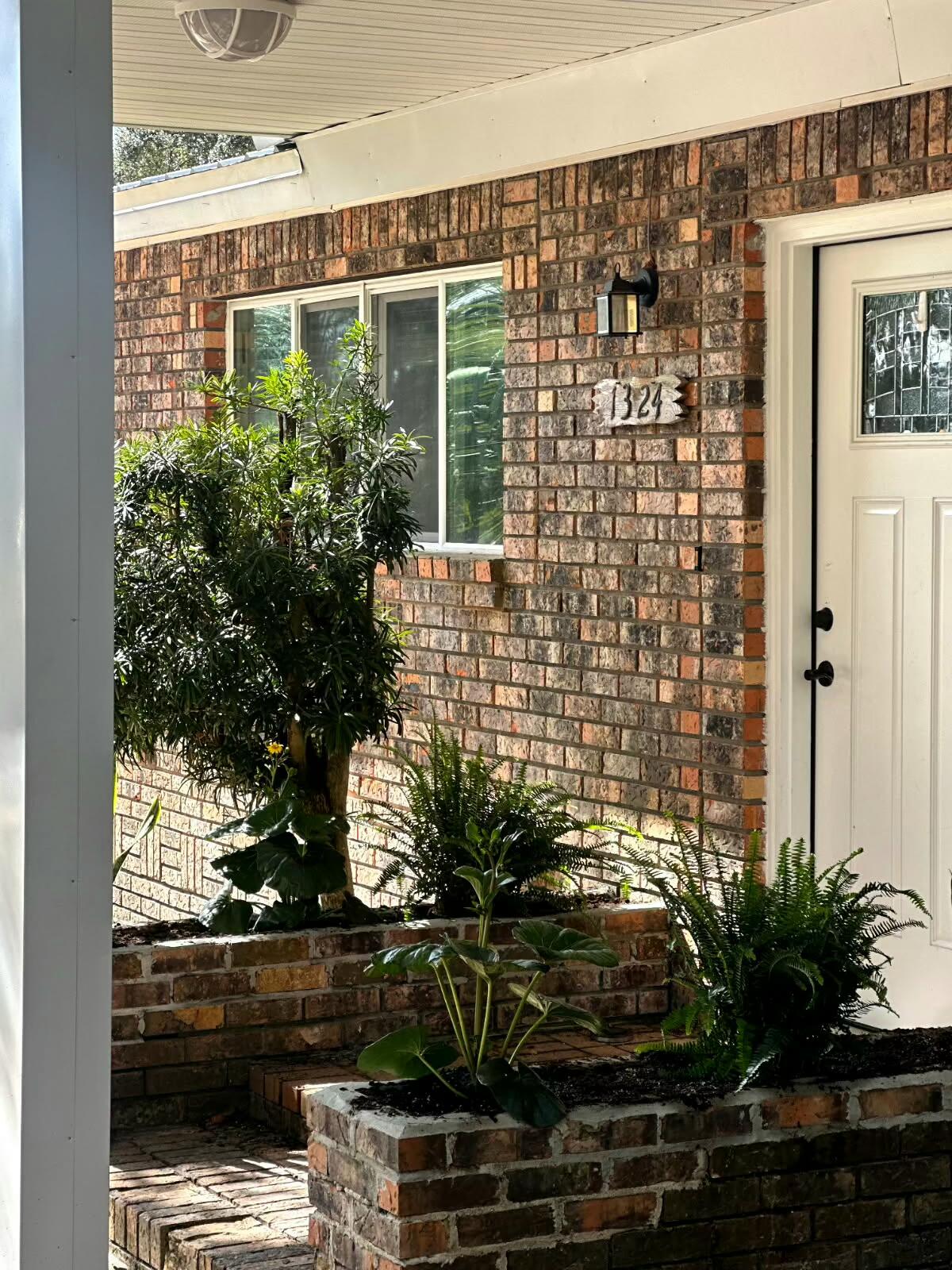 Home is centrally located between the two bases.  5.7 miles to Eglin AFB main gate. 2.9 miles to Hurlburt AFB back gate. Main house is brick with four bedrooms and two baths. Many upgrades with tile floors throughout. Baths were updated as  well.  Kitchen has shaker style cabinets and granite countertops. Large laundry room off kitchen. There is a carport in rear of the home with 325 ft of storage accessible from the kitchen  or carport. New HVAC system summer of 2025. There is a separate two bedroom, one bath apartment in  the back yard. It has been completely upgraded providing a suitable living space for adult children or an in-law apartment. This can be accessed on either of the home. Ample parking in rear.
