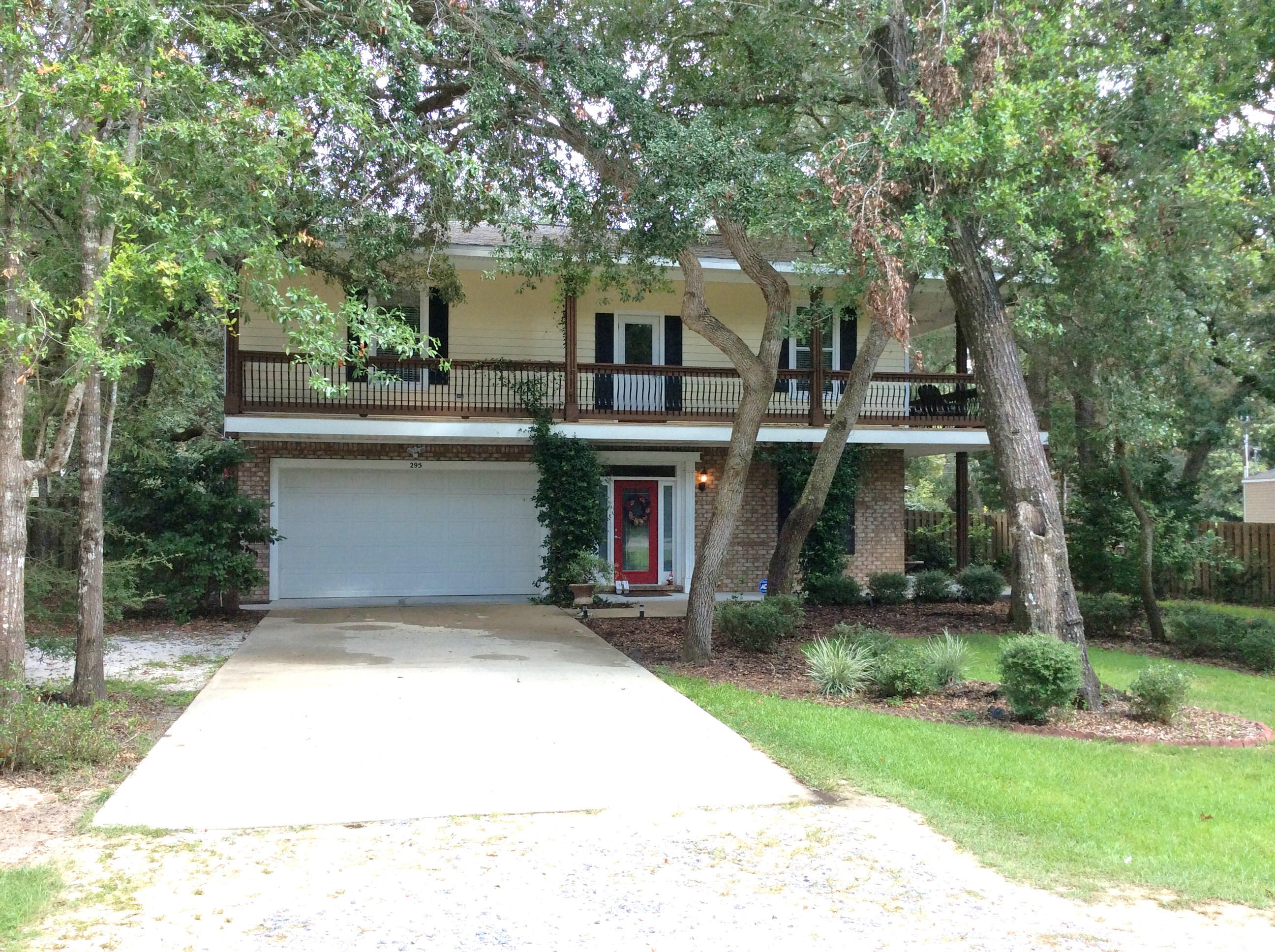All the charm of a New Orleans style home including the wrap around porch. This 4/2.5 home is located in the quiet community of Choctaw Beach. Beautiful open floor plan features a gourmet kitchen with stainless appliances, 9' ceilings downstairs, hardwood flooring, spacious master suite & jack & jill bedrooms for the kids. Your family will enjoy the wrap around 2nd floor porch and the 26 X 14 enclosed lighted pool (Owner supplies pool service) and large fenced-in back yard. There's even a spot to store the boat in the front yard! This is a custom designed home with Bay views. Aprox. 16 miles from Eglin and 5 miles to the MidBay Bridge connector. Owner will consider pets (any pet must be spayed/neutered) but no male cats. No Smoking!! Available Dec. 19th.