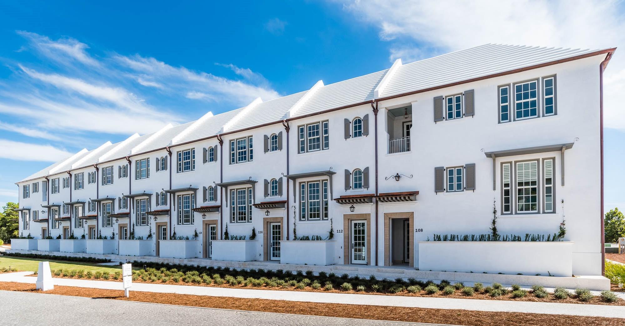 Upon entering this centrally located rowhome, fall under the spell of sophisticated coastal living in a light-filled private oasis. Caliza Courts rowhomes are designed by the renowned Khoury-Vogt Architecture team and form a welcome addition to the breathtaking Caliza Pool location. Beautiful architectural details have been woven into every space of this 4 Bedroom, 4.5 Bath home
Impressive scale of the great room awes with 16-foot ceiling,12-foot tall French doors and windows opening to a private courtyard, and guest suite beyond. Floor plan offers the utmost in comfort to accommodate friends and families. The open concept kitchen captures views of southern sunbathed skies and offers top of the line Thermador appliances, cabinetry, and glass tile accented walls.
The main level Master Suite creates an expansive feel as it occupies the southwest corner above the iconic streetscape.  An elegant soaking tub, shower with Dominican Shellstone tile-surround floor to ceiling and twin vanities complete the Master Bath. Two Guest Suites, each with private baths are perched on the second floor, and enjoy a private Cuban tile accented west facing porch.  
Breezes enhance the private courtyard, accentuated by a serene fountain, dining area, fire pit, Dominican Shellstone paving, and easy to maintain espalier landscaping. Across the court, a covered, open-air loggia fronts a much-desired private guest suite (fourth bedroom), both raised above a two-car garage. Adding to the private experience, this suite has the midnight kitchen feature. The loggia offers another area for lounging, watching TV or dining.
Furnishings and electronics are included with a short list of exclusions.