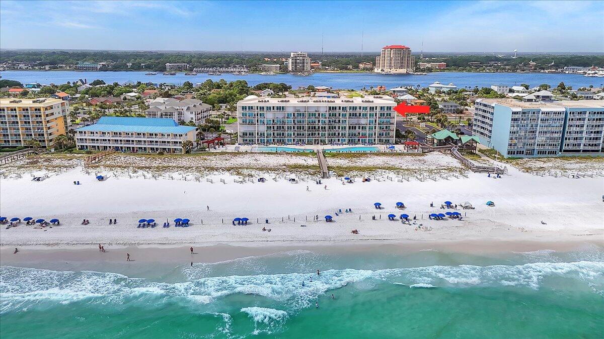 Unwind in Unparalleled Luxury with BREATHTAKING Gulf Views!!
This meticulously maintained, TOP-FLOOR, CORNER unit at Blu on Okaloosa Island offers the ultimate coastal lifestyle. Barely lived in and in pristine condition, this 4-bedroom, 3-bathroom condo boasts 2,053 sf of luxurious living space and over 300 sf of GULF FRONT balcony.
Highlights include:
- Non-smoking building
- Unmatched Gulf Views: Enjoy stunning vistas from the kitchen, master bedroom, and expansive living area. Bedrooms 2-4 offer serene Choctawhatchee Bay views.
- High-End Finishes: Experience the convenience and style of Hunter Douglas remote-controlled shades for effortless light and privacy control.
- Custom Storage Solutions: Maximize space with custom built-in cabinetry and closet systems throughout the cond