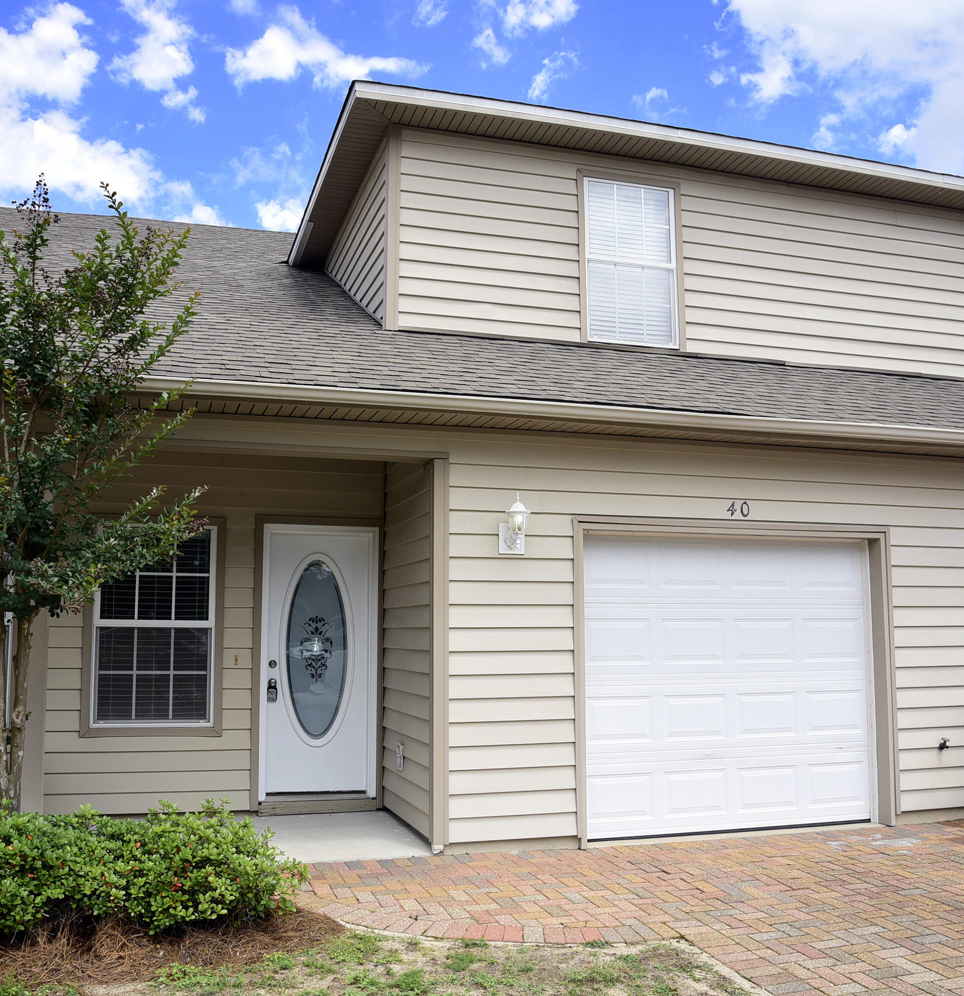 Come see this wonderful townhome in a great location!  You'll be close to Eglin AFB and all the amenities living on the Emerald Coast has to offer. Upon entering you'll find an open floor plan with with wood look laminate flooring in the great room, an oversized dining area and tiled kitchen. The kitchen has plenty of cabinets, granite countertops and stainless appliances as well as a breakfast bar. There's also a half bath on the first floor.  Upstairs there are three bedrooms and two full baths.  The master has wood look flooring, two closets and a large adjoining bathroom. Added features are the attached garage with washer/dryer hook-ups and an open patio in back.