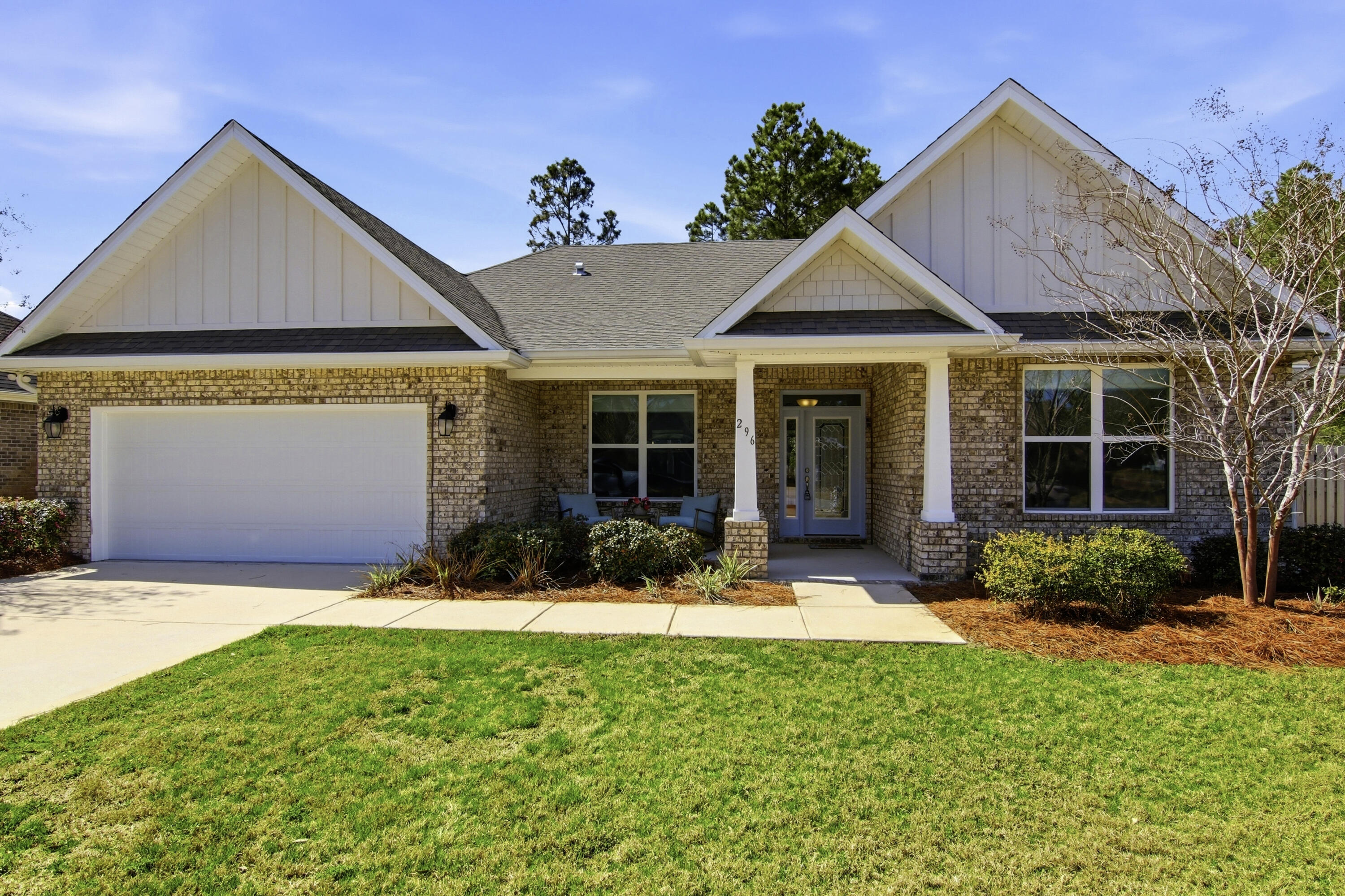 Under Contract with 72 hr Kickout Clause. Located in the established, tree lined, highly sought-after Symphony neighborhood of Hammock Bay, this home is just 3 blocks from state of the art amenities and the town square created for community events and entertainment! The newly built, craftsman style 5 bedroom, 3 full bath split floor plan home is situated on a waterfront corner lot. Instantly catching your eye upon entry, you're welcomed by an impressive sense of space and light. Soaring 12-foot ceilings in the foyer and living room create a grand, open feel. Gentle natural light illuminates from the transom windows lining the back of the home. The elevated ceiling heights combined with the abundant sunlight enhance the openness of the space, creating a bright, warm, and inviting atmosphere that feels both elegant and comfortable. 9-foot ceilings throughout the remainder of the home maintain an airy and cohesive flow. 
From the gathering room, the home flows seamlessly into a beautifully appointed kitchen designed for both everyday living and entertaining. Featuring quartz countertops, a gas range, abundant cabinetry, a spacious walk-in pantry, and an additional butler's pantry, this kitchen offers both style and functionality. A large breakfast room provides the perfect setting for casual dining, while the oversized island with sink overlooks the private, picturesque backyard -- offering serene pond views and making it easy to stay connected to outdoor gatherings. In addition to the spacious bedrooms, the versatile fifth bedroom offers the flexibility to easily double as a private home office, study, or flex space to best suit your needs. 
Hammock Bay is a premier, bayfront master planned community located just 15 minutes north of the white sand beaches of the Emerald Coast. A 6,000 square foot clubhouse offers residents use of the movie theatre with auditorium seating, a full caterer's kitchen to include wet bar and dining area, childs play room, and lounge overlooking the lake and pool area. Numerous on site workout and fitness facilities, competition lap pool, additional 4 Resort-style pools, pickleball courts, tennis courts, basketball court, large playground, outdoor kitchen/gas bbq areas. A Bay front club house with fishing pier extending 500' in to the bay, an amphitheater like stage with jumbotron screen, are just a few attractions with more on the near horizon! All residents at Hammock Bay will enjoy year-round social events as well as a vibrant and active Town Center. Consider this an invitation to experience the Hammock Bay Lifestyle by contacting me today for an updated list of this months community events calendar!