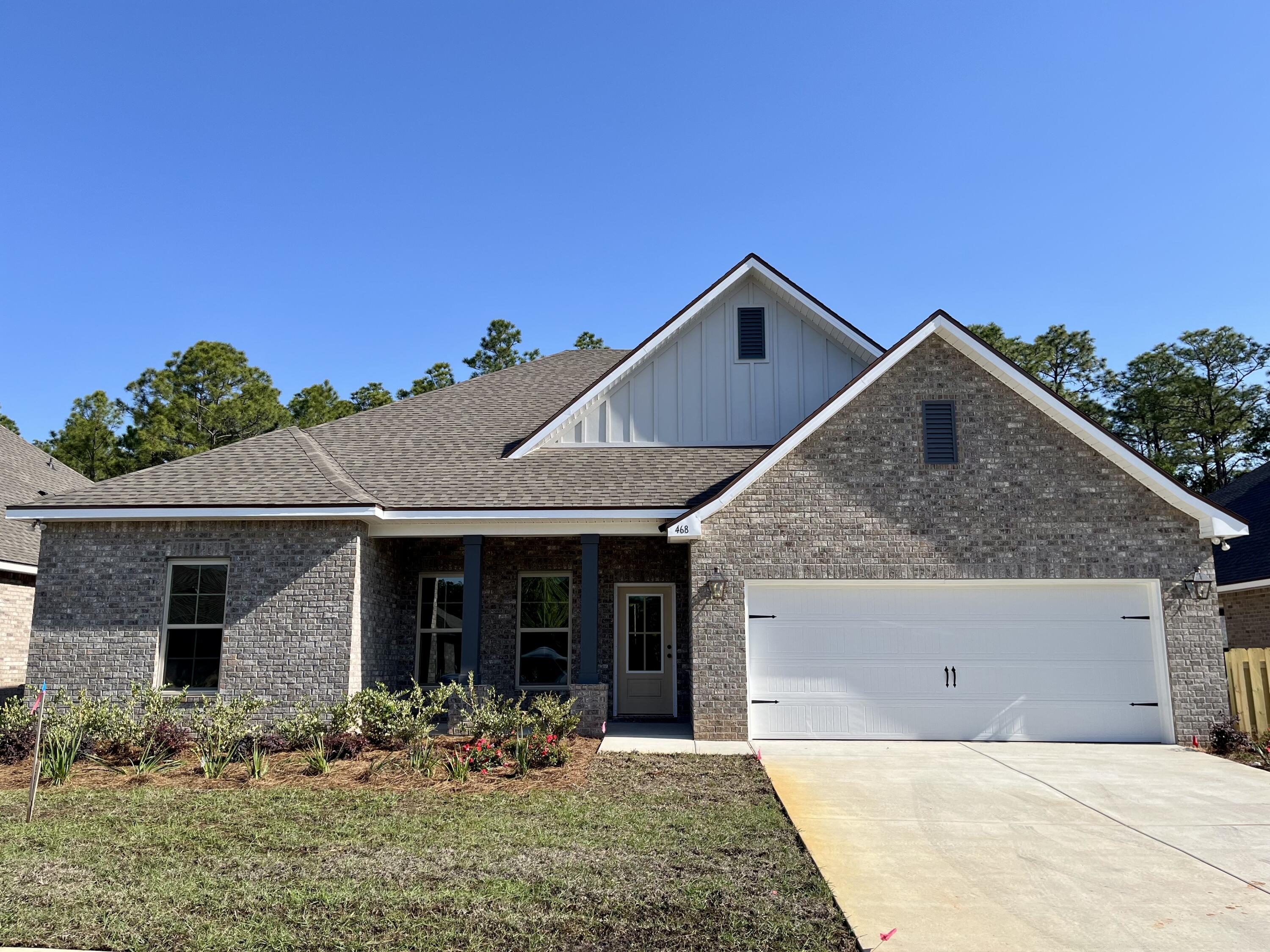 The COMSTOCK III H in Bird Song at Hammock Bay community offers a 4BR, 2BA, open design. Upgrades added (list attached).  
Features: double vanity, garden tub, separate custom tiled shower, and walk-in closet in master suite, kitchen island, walk-in pantry, boot bench in mudroom, covered front porch and rear patio, walk-in closets, crown molding, recessed lighting, framed mirrors, smart connect WIFI thermostat, smoke/carbon monoxide detectors, landscaping package, architectural 30-year shingles, flood lights, and more!
Energy Efficient Features: water heater, kitchen appliance package, vinyl low E windows, and more! Energy Star Partner.