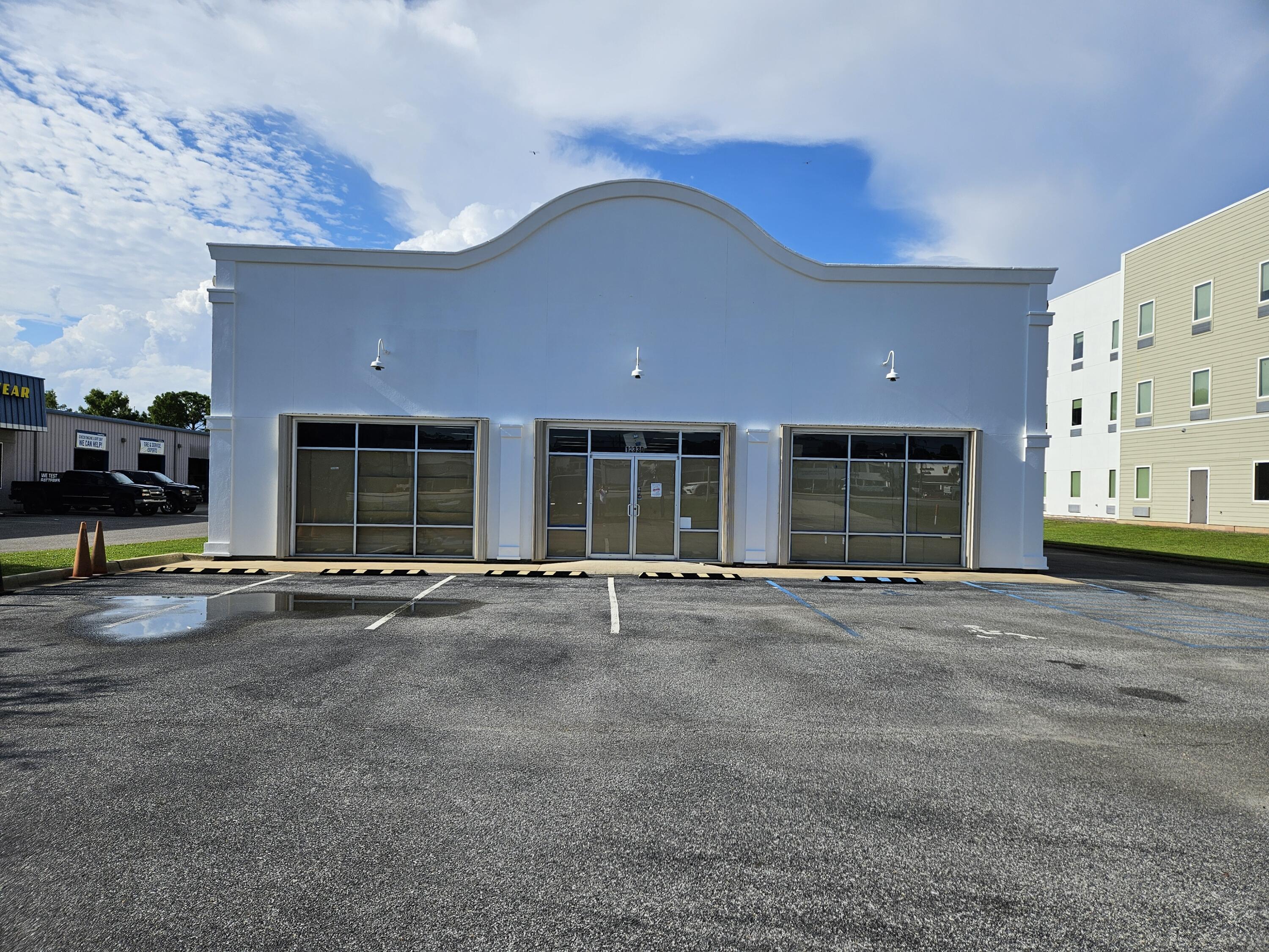 Stunning Commercial Opportunity on Prominent US-98, Miramar Beach Welcome to a prime commercial property ideally situated at 12330 US Highway 98 W—offering exceptional visibility with 100 ft of frontage on one of Miramar Beach's busiest thoroughfares, with over 50,000 vehicles per day Key Upgrades: Brand-new A/C systems ensure efficient climate control throughout. Tankless water heater added for energy efficiency and endless hot water supply. Exterior renovations currently underway, including fresh paint, and modernized curb appeal. Property Highlights: 9,400± SF total area on a 0.92-acre lot (100×404).


4,600 SF heated/cooled showroom & storefront; spacious rear storage with loading/receiving. 2,500 SF 1st floor with 2,300 SF mezzanine-ready second floor in the storage wing heated and cooled ideal for offices or additional rental space.

Previously operated as a mattress store, presenting a wide-open, highly customizable interior.

11 front parking spaces with room to expand on the east and rear.

Zoned for commercial use, including retail perfect for your next venture.

Ideal for owner-occupiers, investors, or developers seeking a high-traffic location.

Strong potential for retail, service, or multi-tenant use, with easy access and visibility.

Location & Accessibility:
Exceptional exposure on a high-volume segment of US 98 in the Miramar/San Destin Resort area.

Easily accessible from both directions on the highway.

Less than a mile from the Emerald Coast Parkway, and mere minutes from top-tier shopping, dining, and beach access.

Why This Property Stands Out:
Feature Benefits
Prominent Frontage Maximum brand visibility and traffic exposure.
Turnkey Systems New HVAC and water heater reduce maintenance worries.
Flexible Layout Expansive, open interiors ready for any build-out.
Ample Parking Multiple existing spots with expansion potential.
Growth Area Positioned in a thriving resort corridor with rising commercial appeal.

12330 US Highway 98 W delivers turnkey infrastructure, high visibility, and unmatched flexibility in a booming resort market don't miss this rare opportunity!

All descriptions and dimensions to be verified by buyer for accuracy.