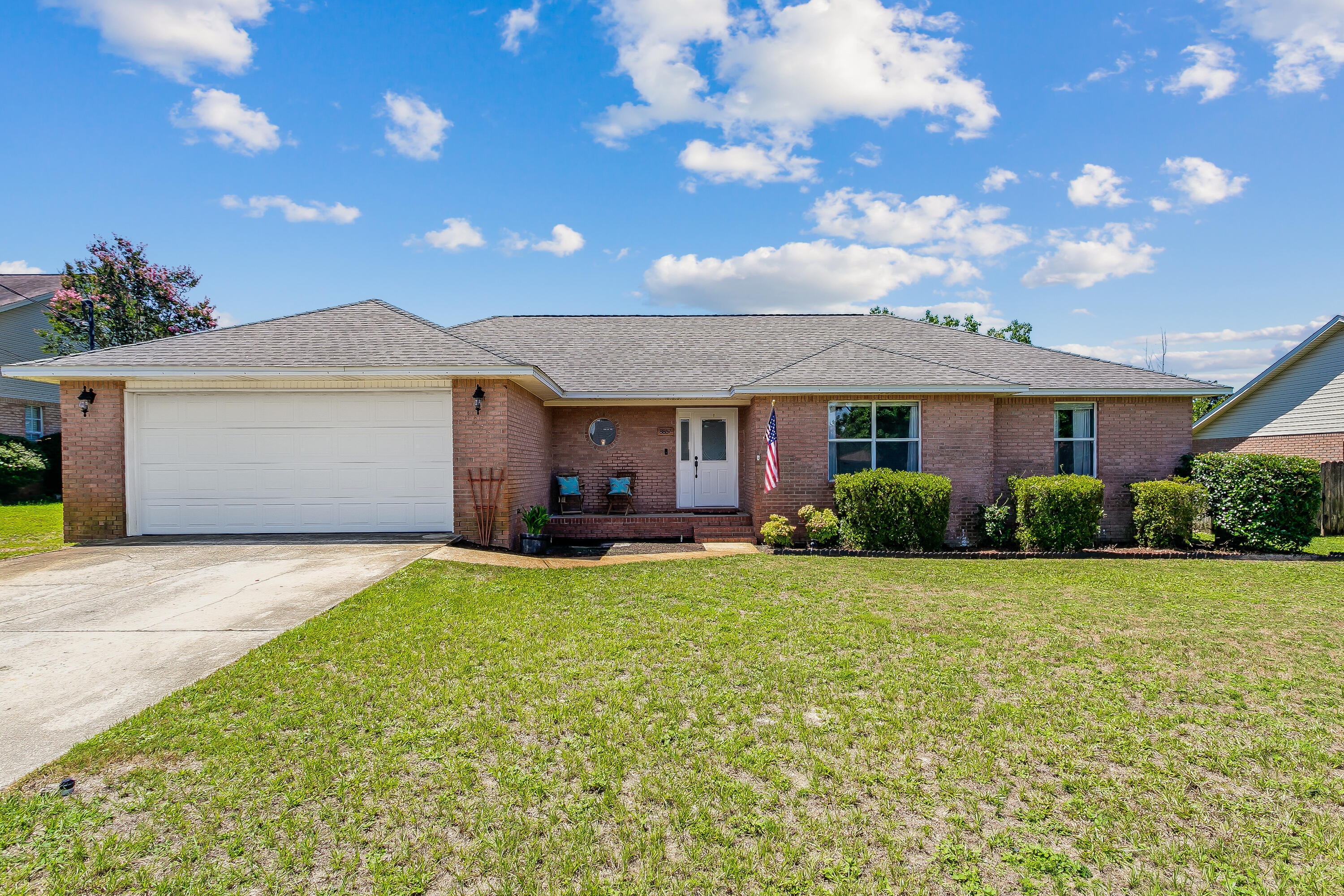 Beautiful brick home, no HOA! This home has many updates: granite countertops, stainless steel appliances, stainless steel farmhouse sink, painted cabinets, floating pantry shelves, new faucet, white tile backsplash. The home has new paint throughout and new flooring in all common living areas. The living room is open concept with a wood burning whitewashed brick fireplace that has a new mantle and vaulted ceilings. The home has new blinds and the 2 exterior back doors feature blinds that are inside of the glass. Both bathrooms have been updated with wood countertops and bowl sinks, new faucets, shower heads and lighting. The hot water heater is new as of 2022, sellers will install a new roof at closing. The backyard has been cleared and maintained with a privacy fence and covered porch.