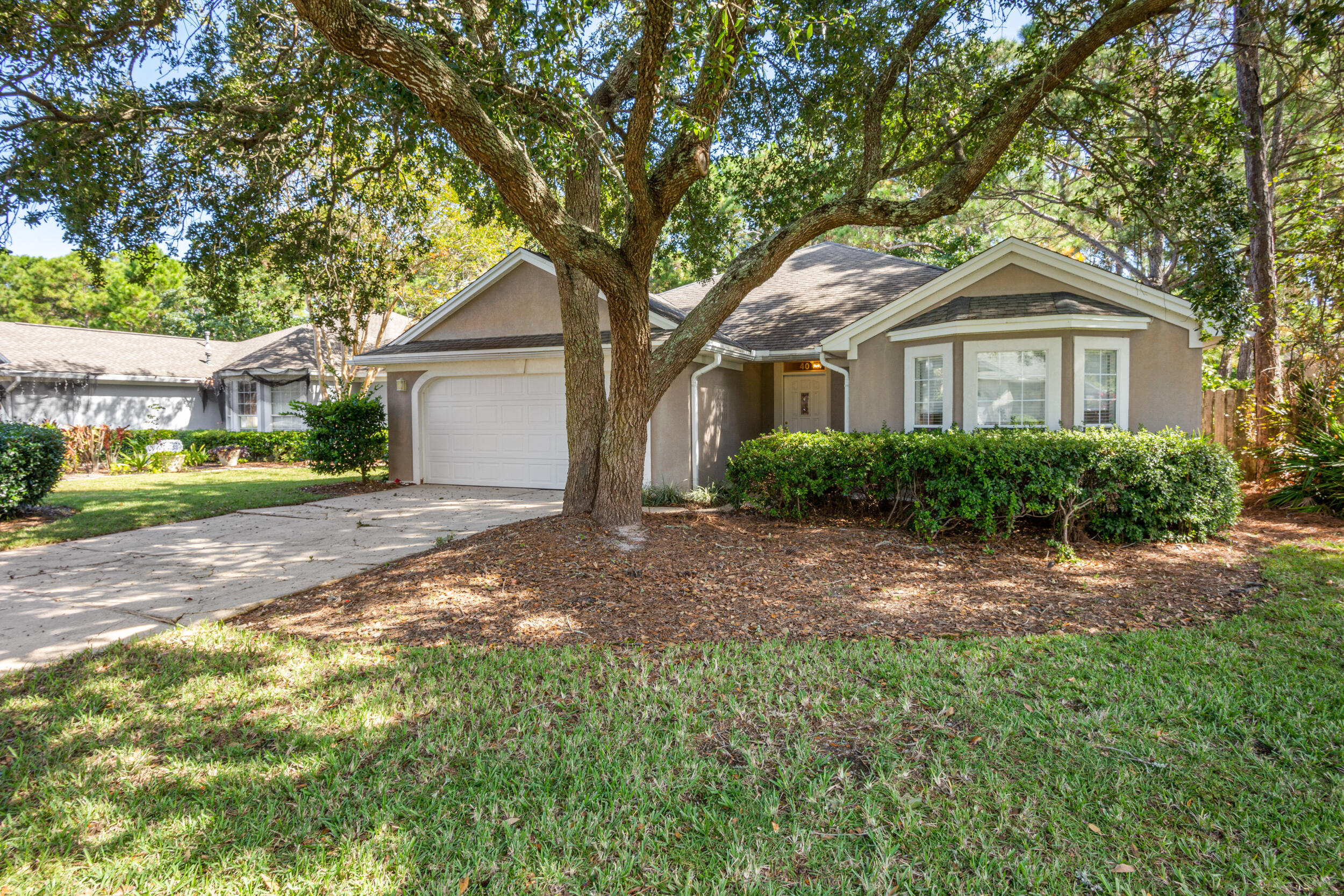 This home, located in the beautiful community of Bayside, has access to all the conveniences and amenities that have made this area so sought after. Walking through the front door you immediately notice how well the home is laid out. Complete with a two car garage and screened in porch, it is a must-see. 

Recent upgrades include AC, hot water heater, and roof is not original. Don't hesitate to schedule your showing today and see all the potential the home has to offer!